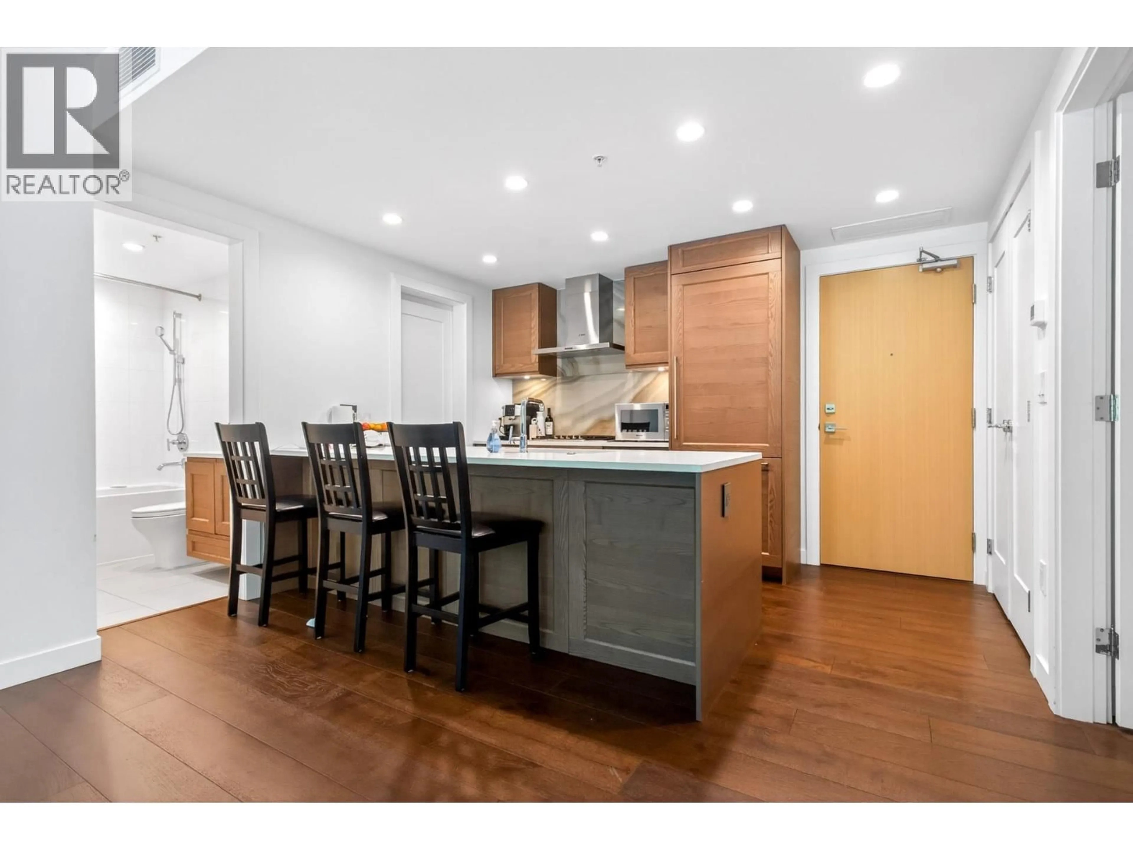 Open concept kitchen, wood/laminate floor for 204 - 5629 BIRNEY AVENUE, Vancouver British Columbia V6S0L5