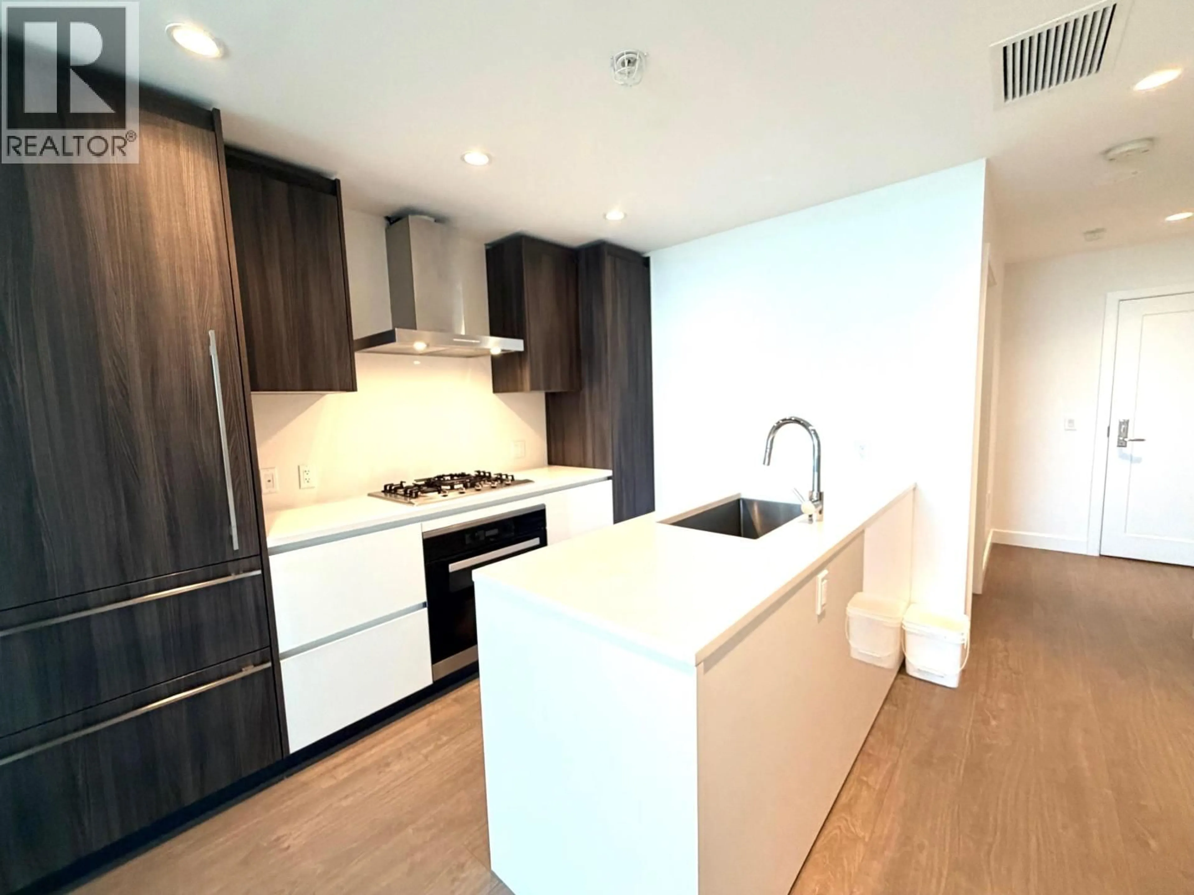 Open concept kitchen, wood/laminate floor for 820 - 6328 NO. 3 ROAD, Richmond British Columbia V6Y0L6
