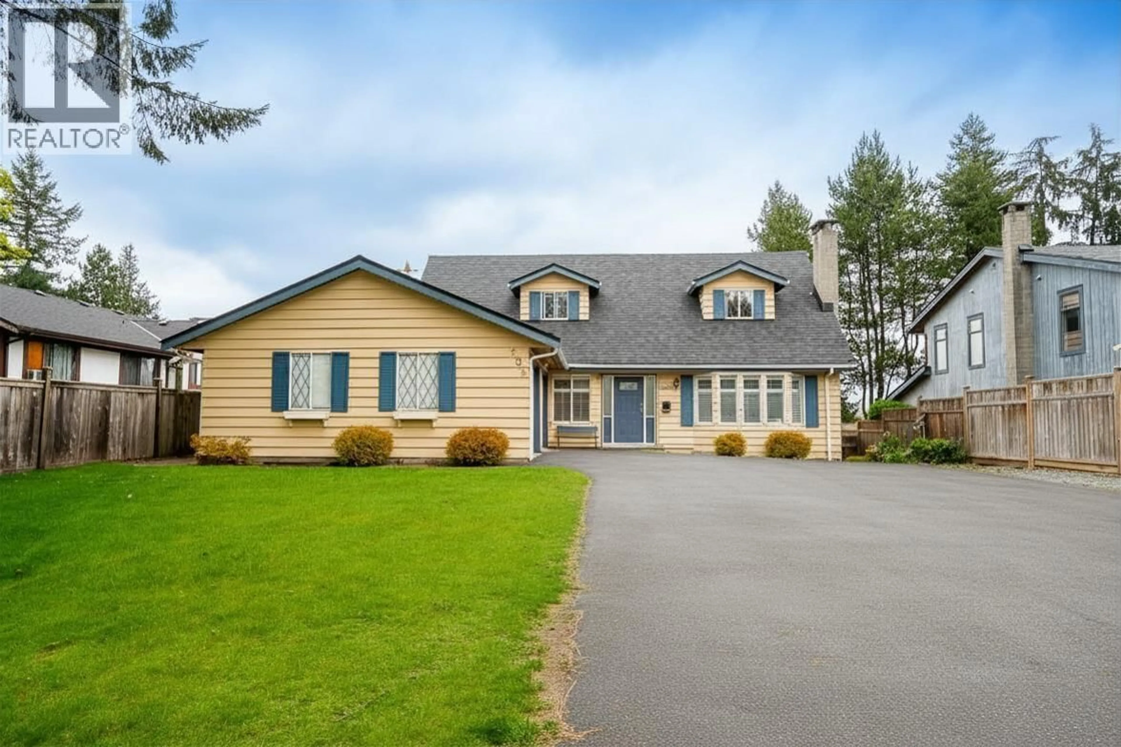 Home with vinyl exterior material, street for 605 WATERLOO DRIVE, Port Moody British Columbia V3H3K9