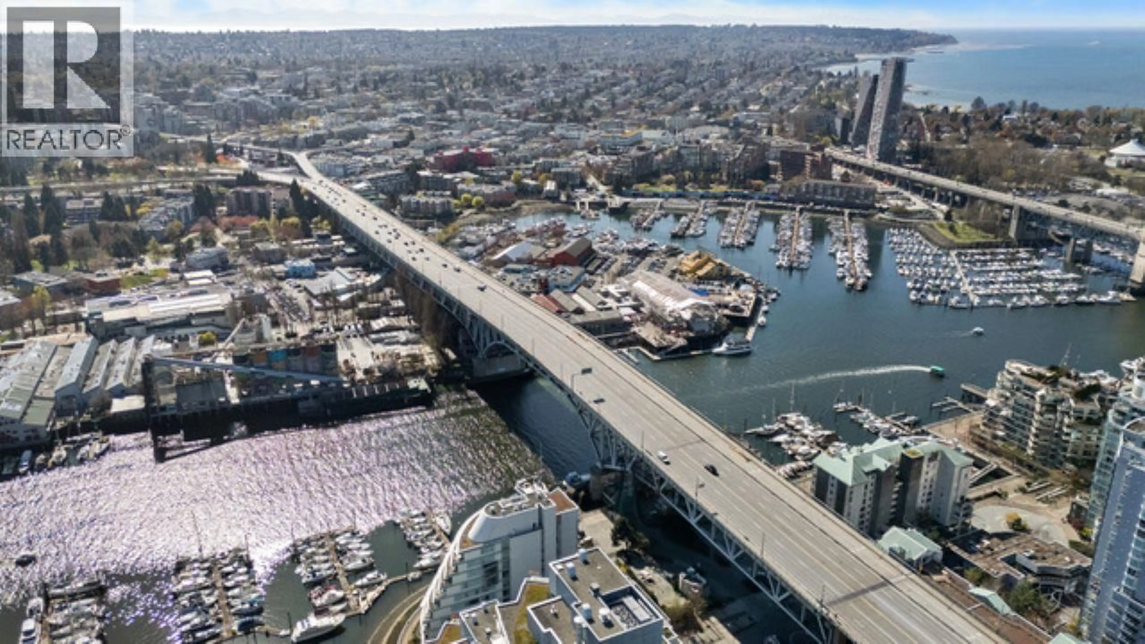 A pic from outside/outdoor area/front of a property/back of a property/a pic from drone, water/lake/river/ocean view for 2003 - 499 PACIFIC STREET, Vancouver British Columbia V6B0N4