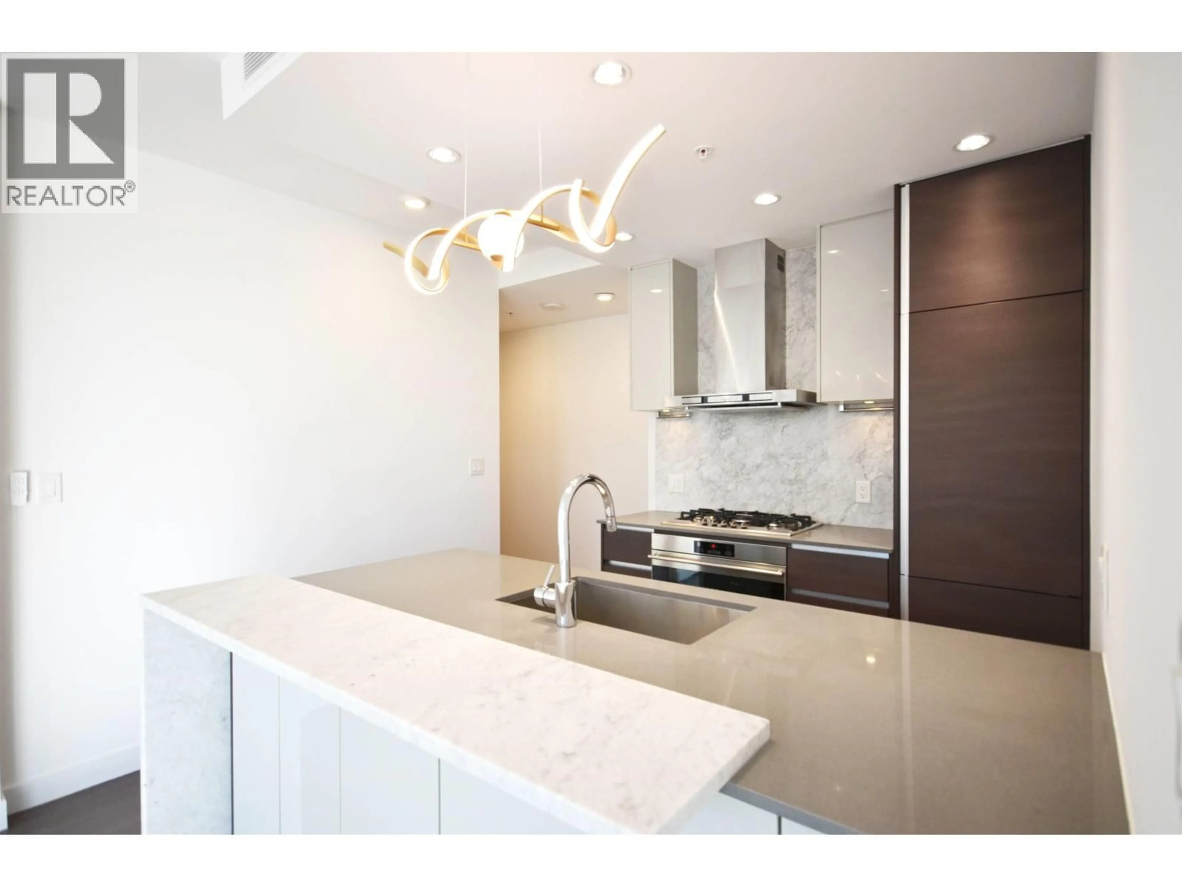 Open concept kitchen, ceramic/tile floor for 502 - 6098 STATION STREET, Burnaby British Columbia V5H0H4