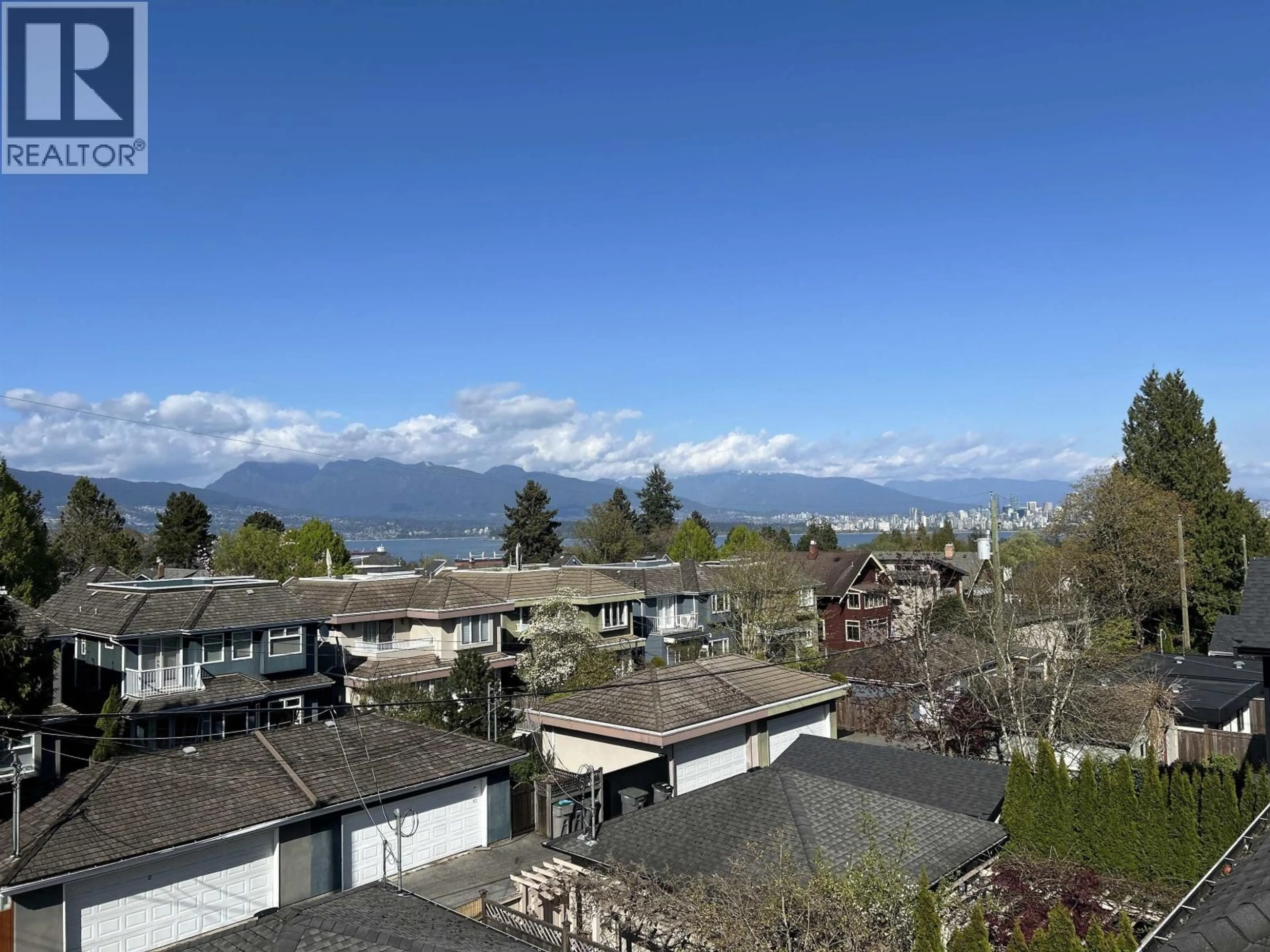 A pic from outside/outdoor area/front of a property/back of a property/a pic from drone, mountain view for 4555 9TH AVENUE, Vancouver British Columbia V6R2E2