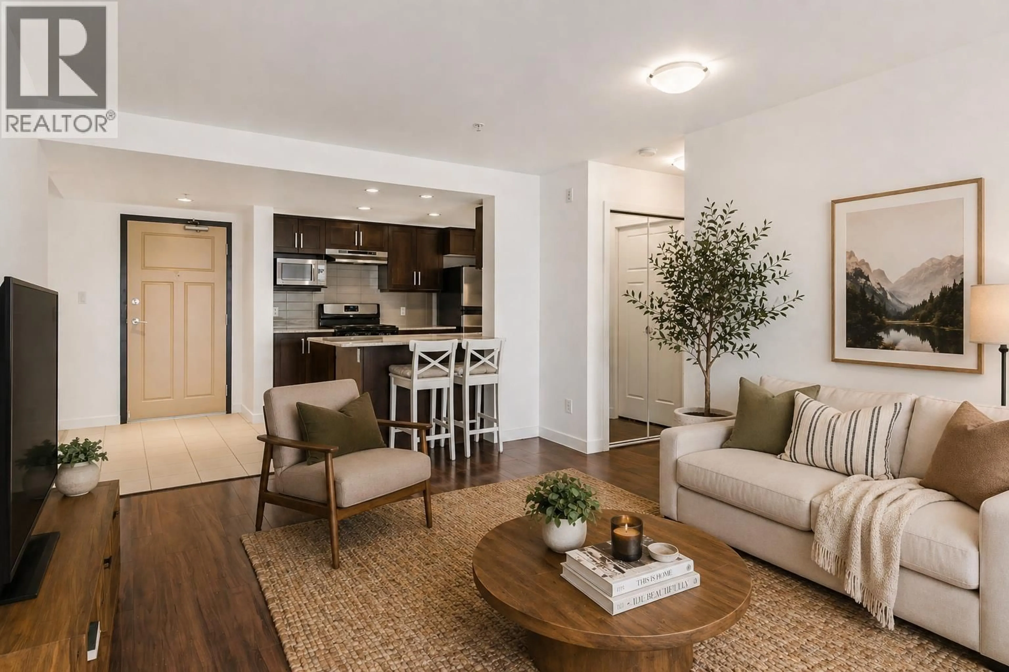 Living room with furniture, wood/laminate floor for 203 - 1212 MAIN STREET, Squamish British Columbia V8B0A6