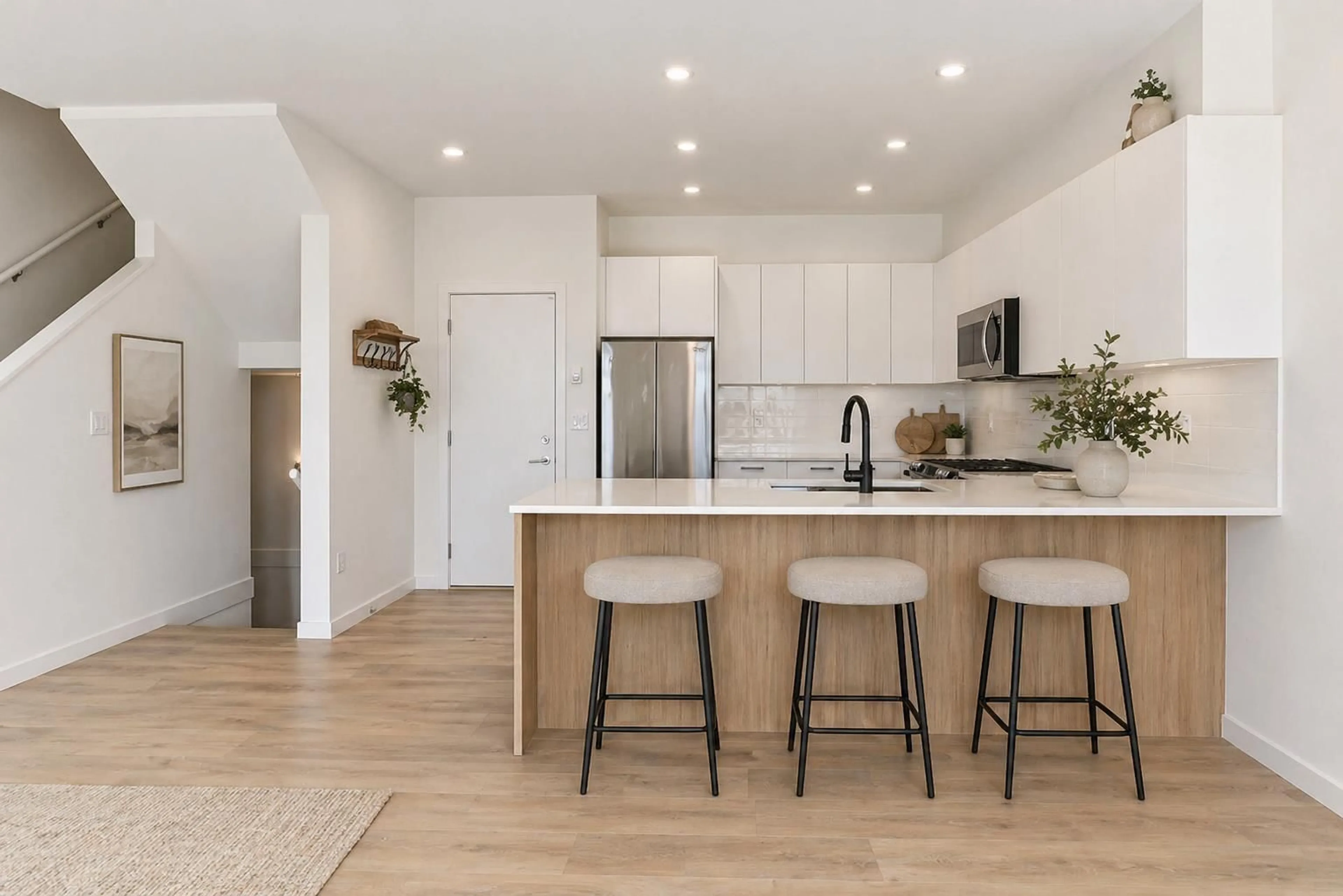 Open concept kitchen, wood/laminate floor for 100 - 15255 SITKA DRIVE, Surrey British Columbia V3S0B1