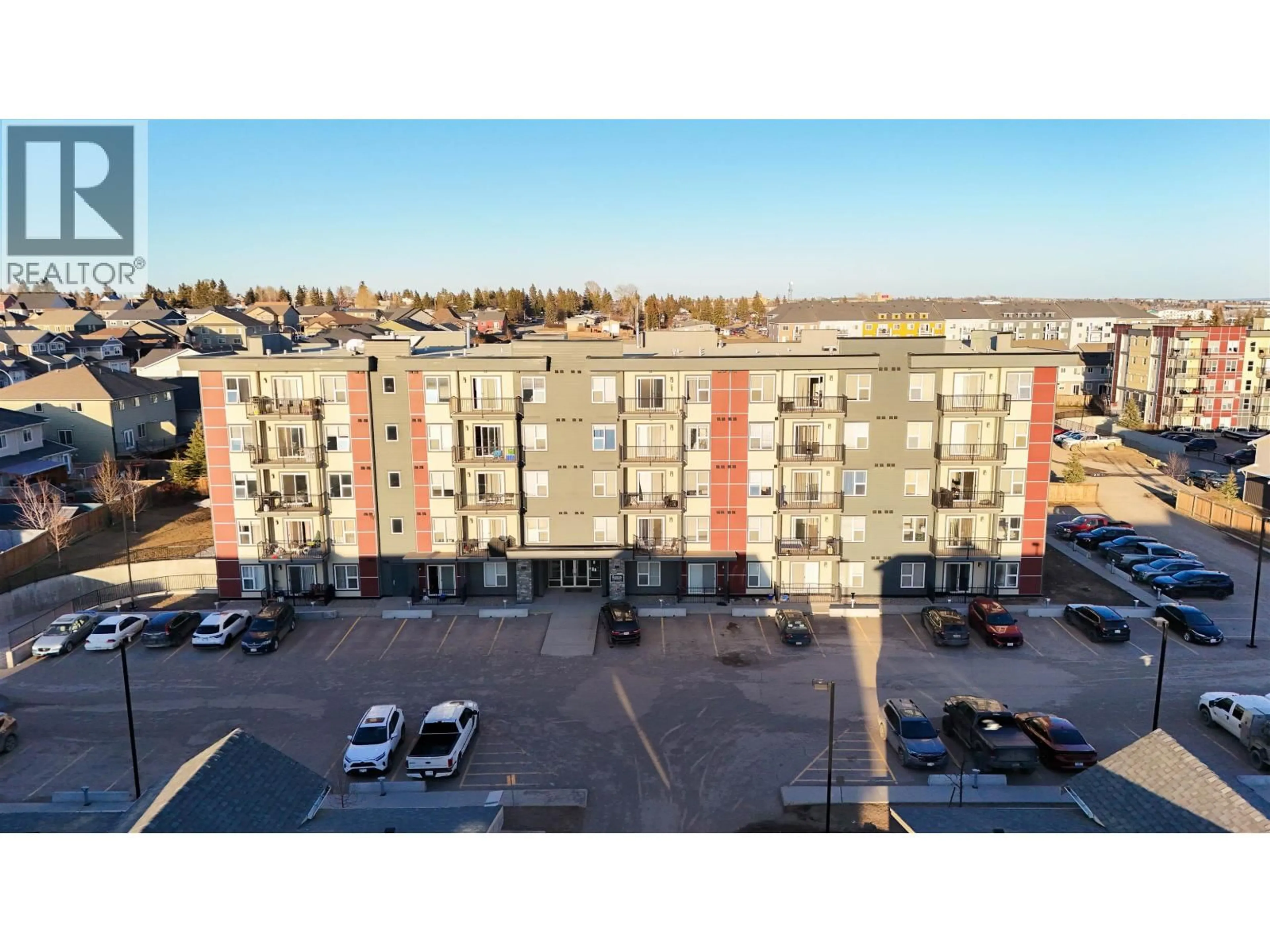 A pic from outside/outdoor area/front of a property/back of a property/a pic from drone, building for 410 - 10307 112 STREET, Fort St. John British Columbia V1J0N6