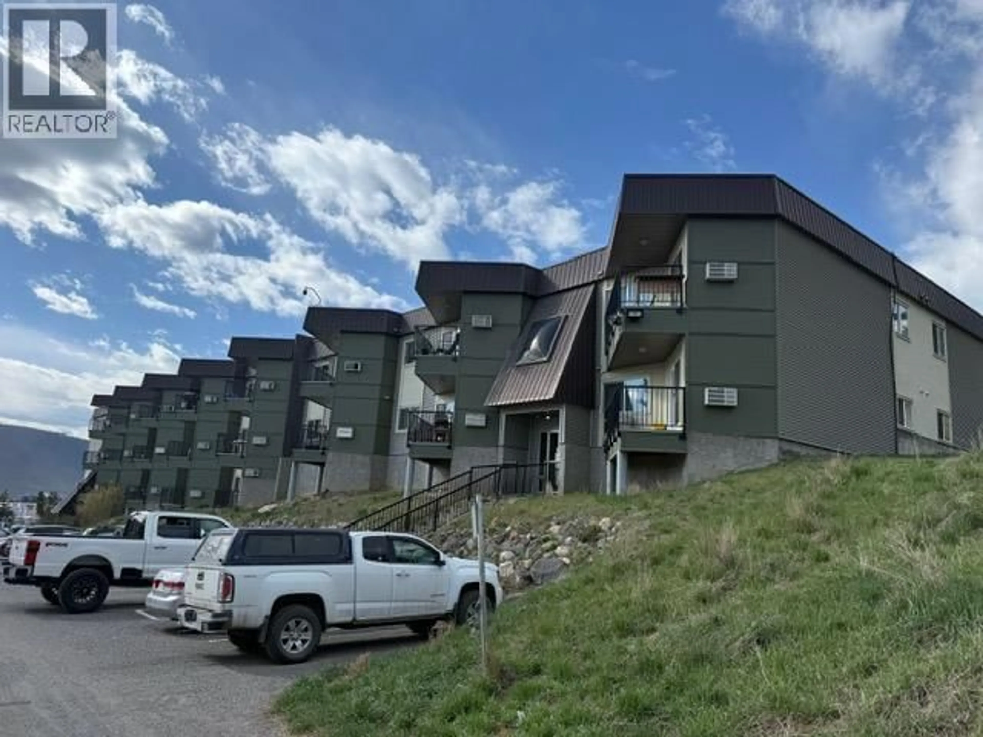 A pic from outside/outdoor area/front of a property/back of a property/a pic from drone, mountain view for 417 - 282 BROADWAY AVENUE, Williams Lake British Columbia V2G4J8