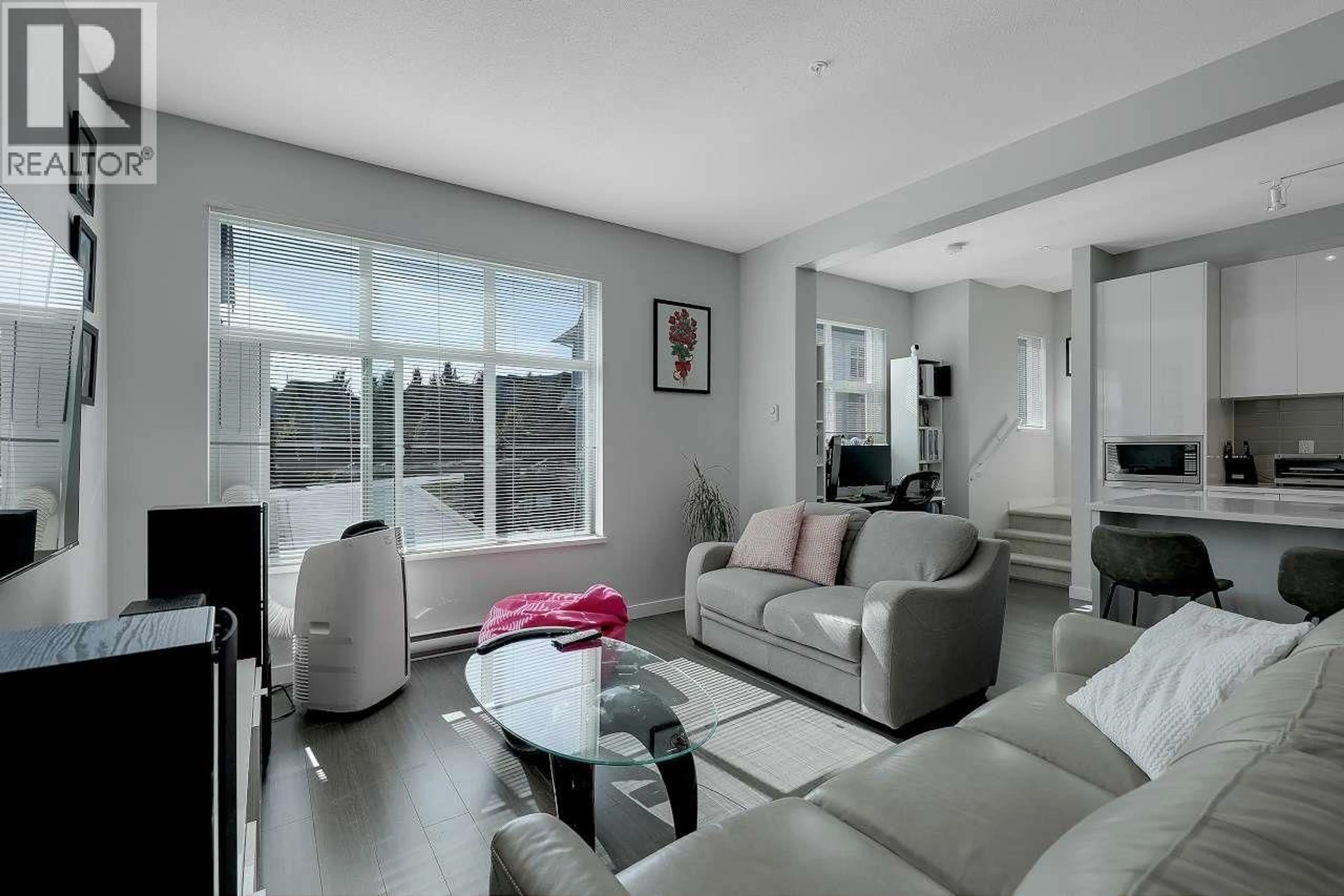 Living room with furniture, unknown for 2802 - 23061 LOUGHEED AVENUE, Maple Ridge British Columbia V2X4L3