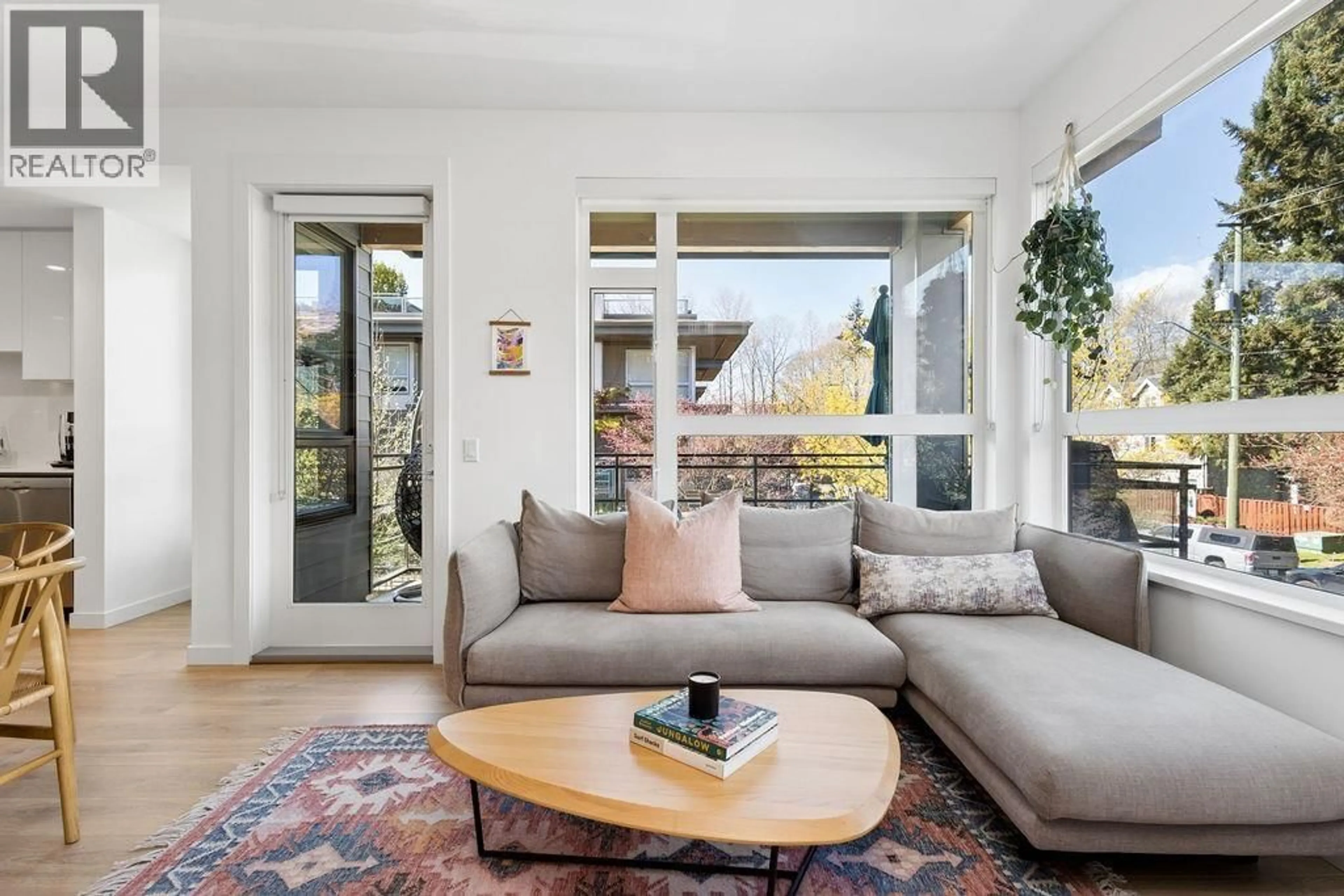 Living room with furniture, unknown for 107 - 715 15TH STREET, North Vancouver British Columbia V7M1T2