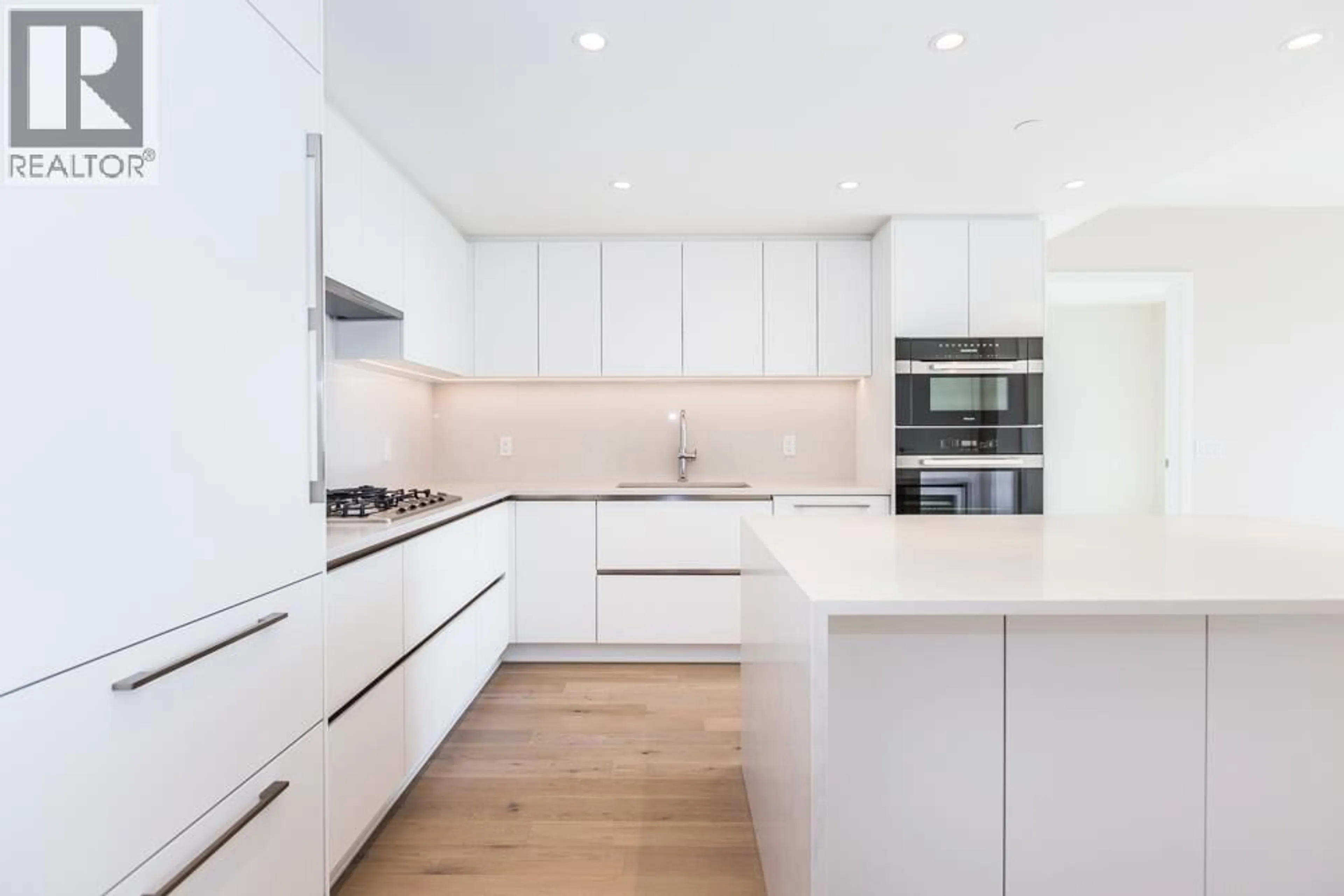 Contemporary kitchen, wood/laminate floor for 2101 - 485 42ND AVENUE, Vancouver British Columbia V5Y0R6