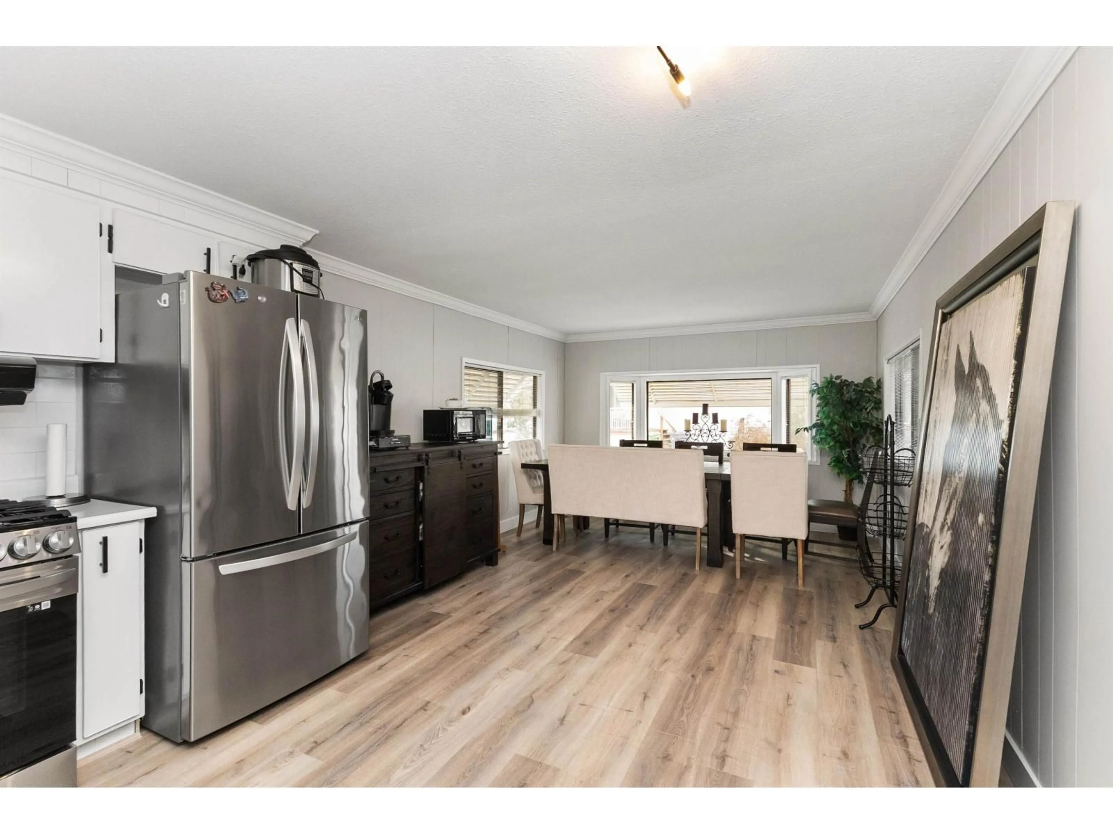 Open concept kitchen, wood/laminate floor for 61 - 24330 FRASER HIGHWAY, Langley British Columbia V3A4R3