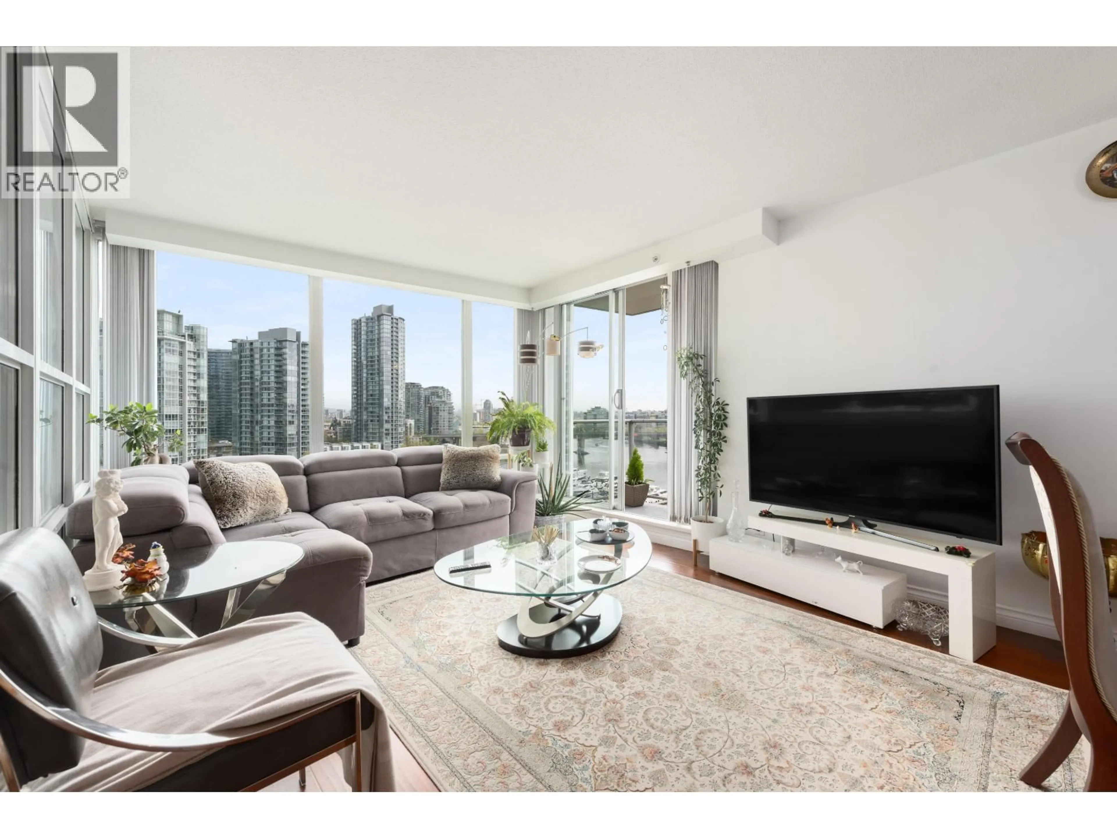 Living room with furniture, unknown for 1201 - 1228 MARINASIDE CRESCENT, Vancouver British Columbia V6Z2W4