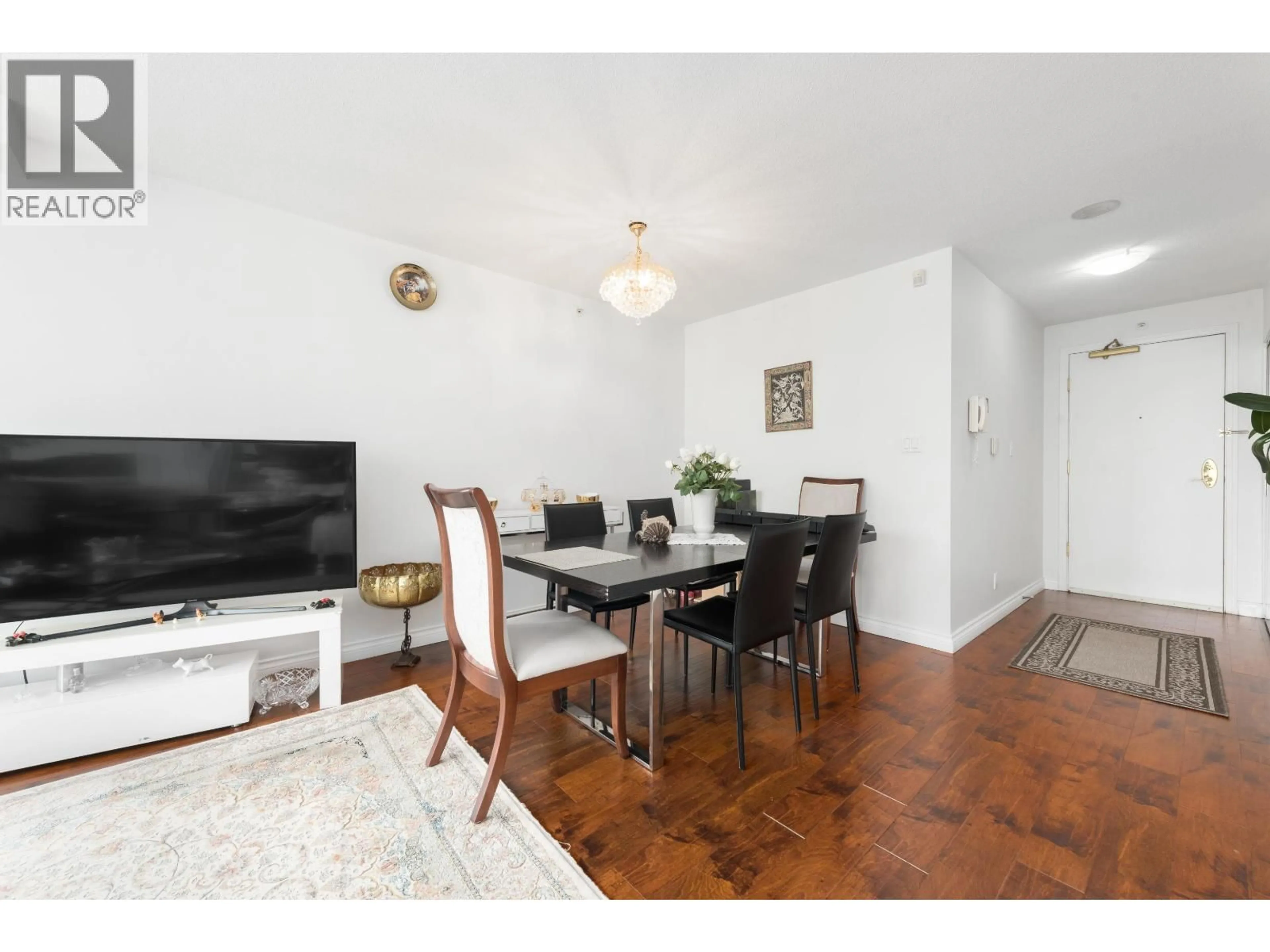 Dining room, wood/laminate floor for 1201 - 1228 MARINASIDE CRESCENT, Vancouver British Columbia V6Z2W4