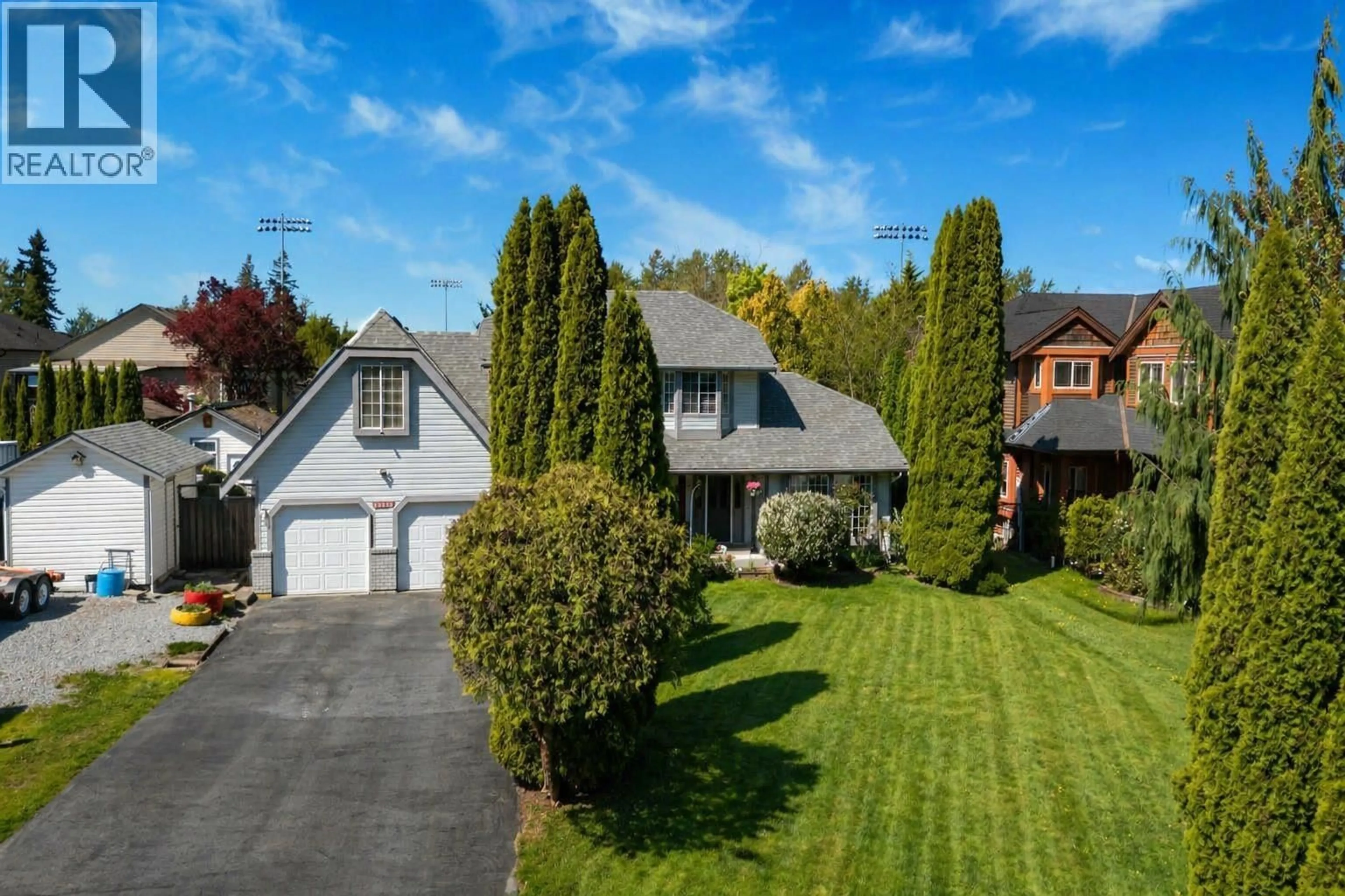 A pic from outside/outdoor area/front of a property/back of a property/a pic from drone, street for 10583 245B STREET, Maple Ridge British Columbia V2W1G5