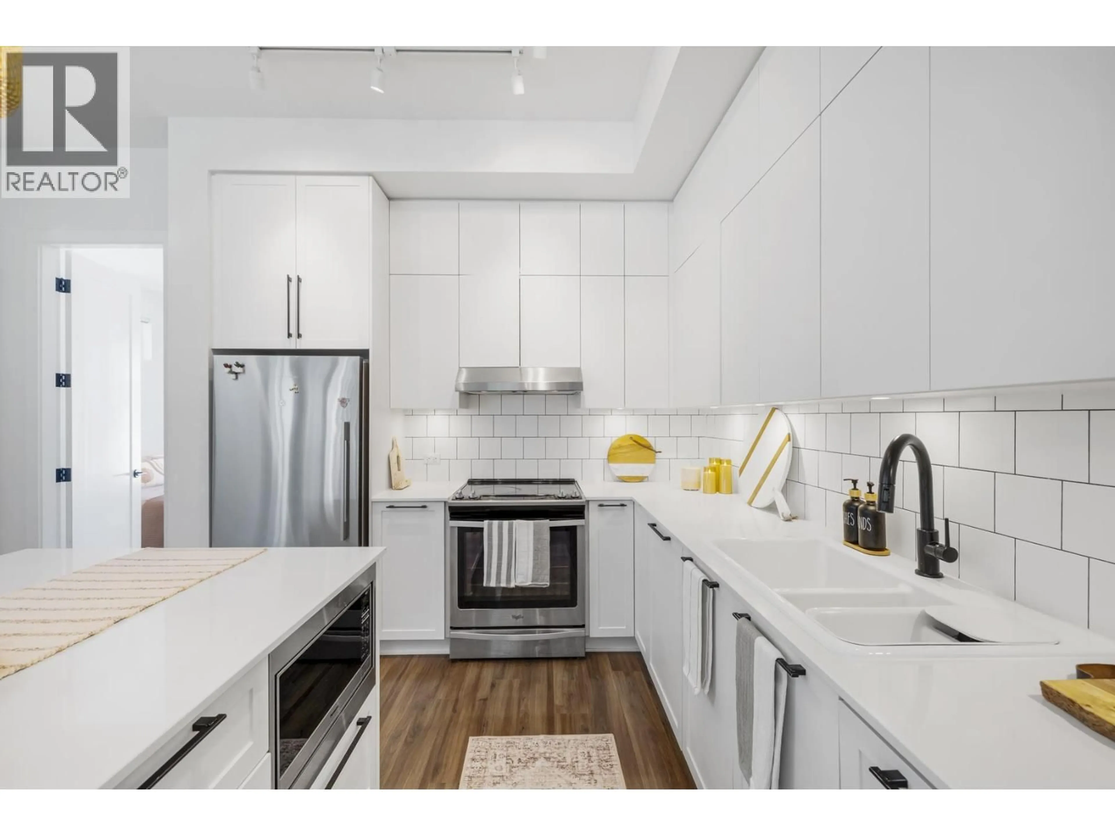 Open concept kitchen, ceramic/tile floor for 110 - 4638 ORCA WAY, Tsawwassen British Columbia V4M0C2