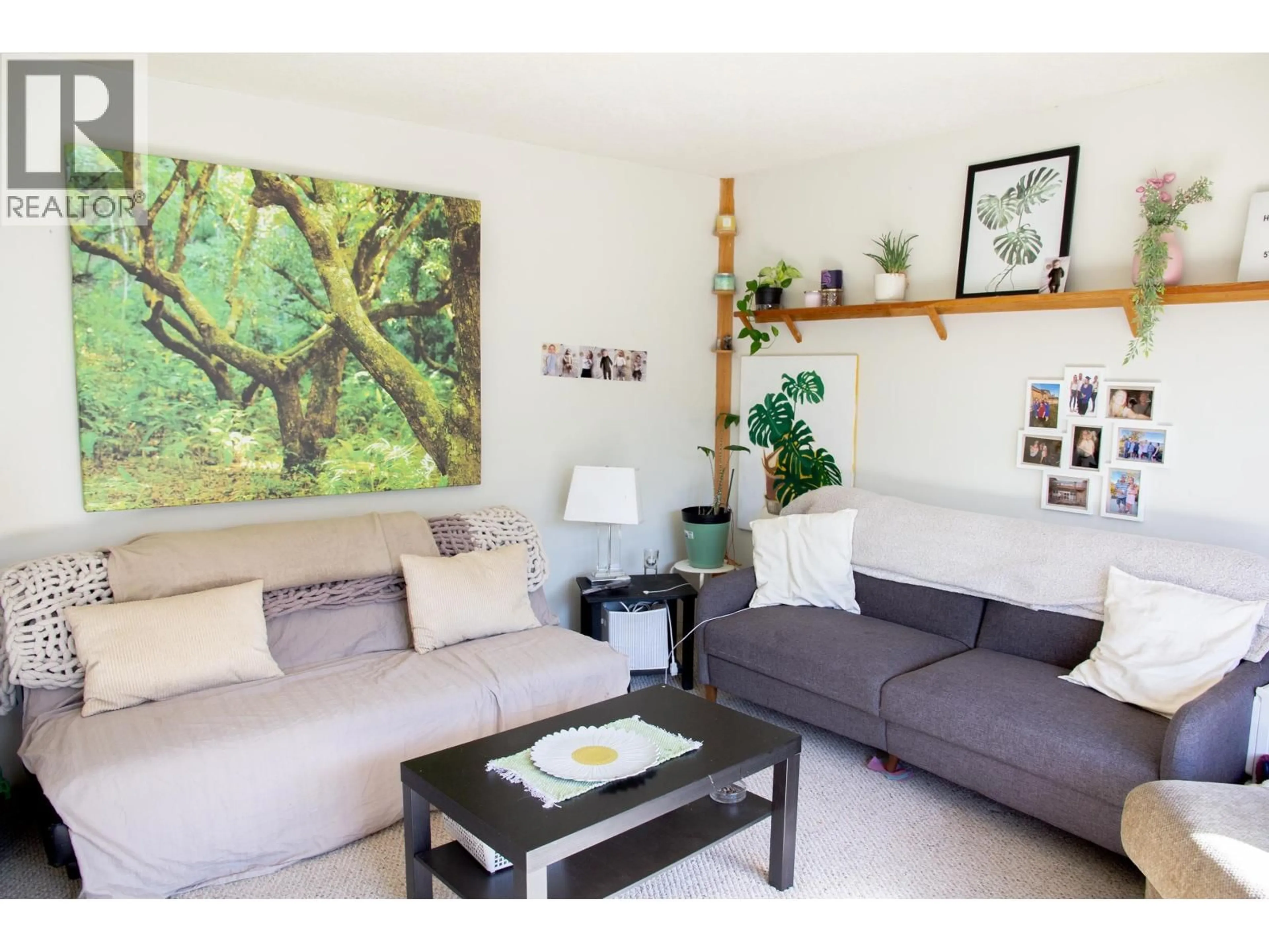 Living room with furniture, wood/laminate floor for 5754 BINNACLE AVENUE, Sechelt British Columbia V7Z0R4