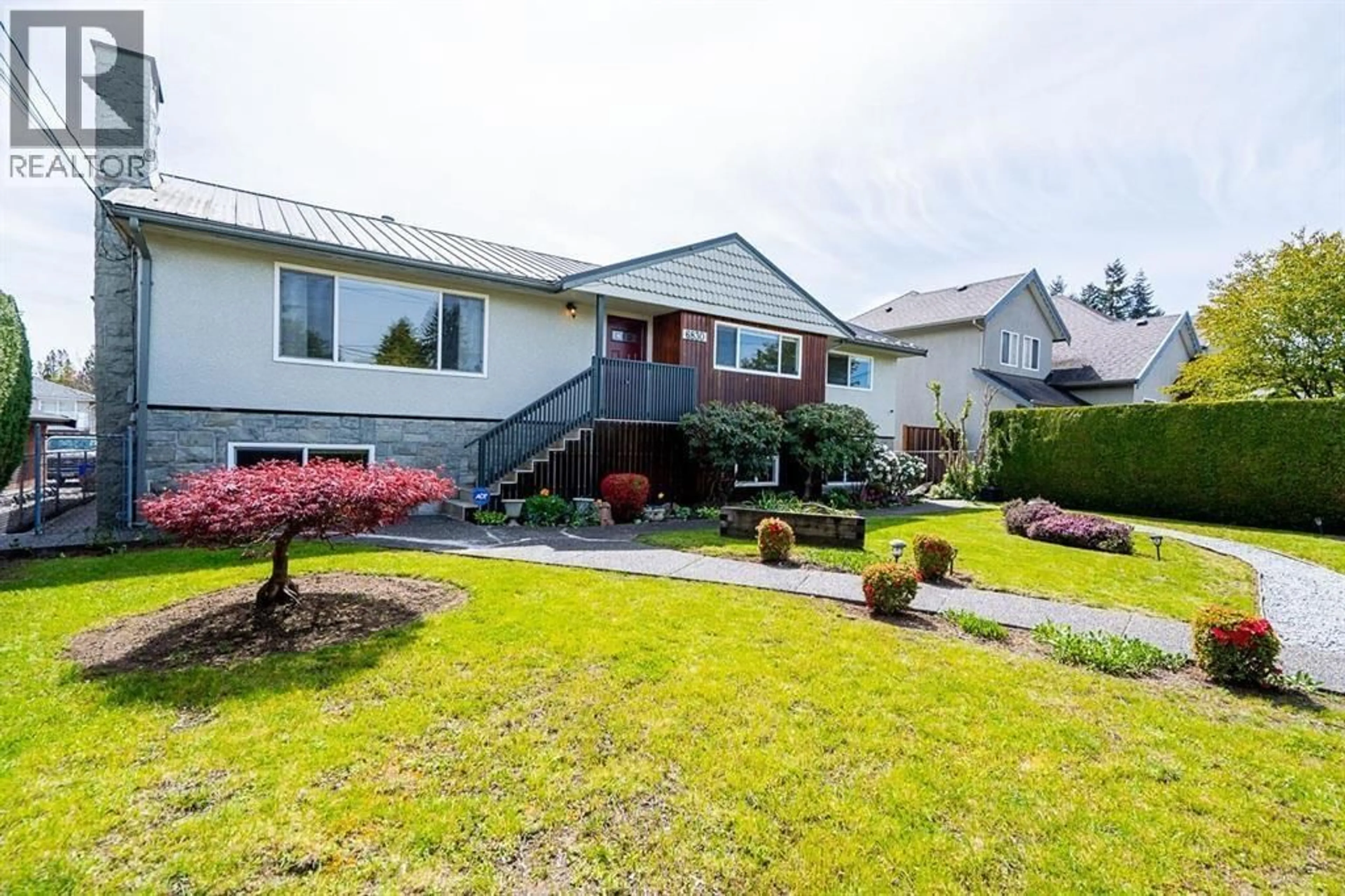 Home with vinyl exterior material, street for 6830 CURTIS STREET, Burnaby British Columbia V5B2B1