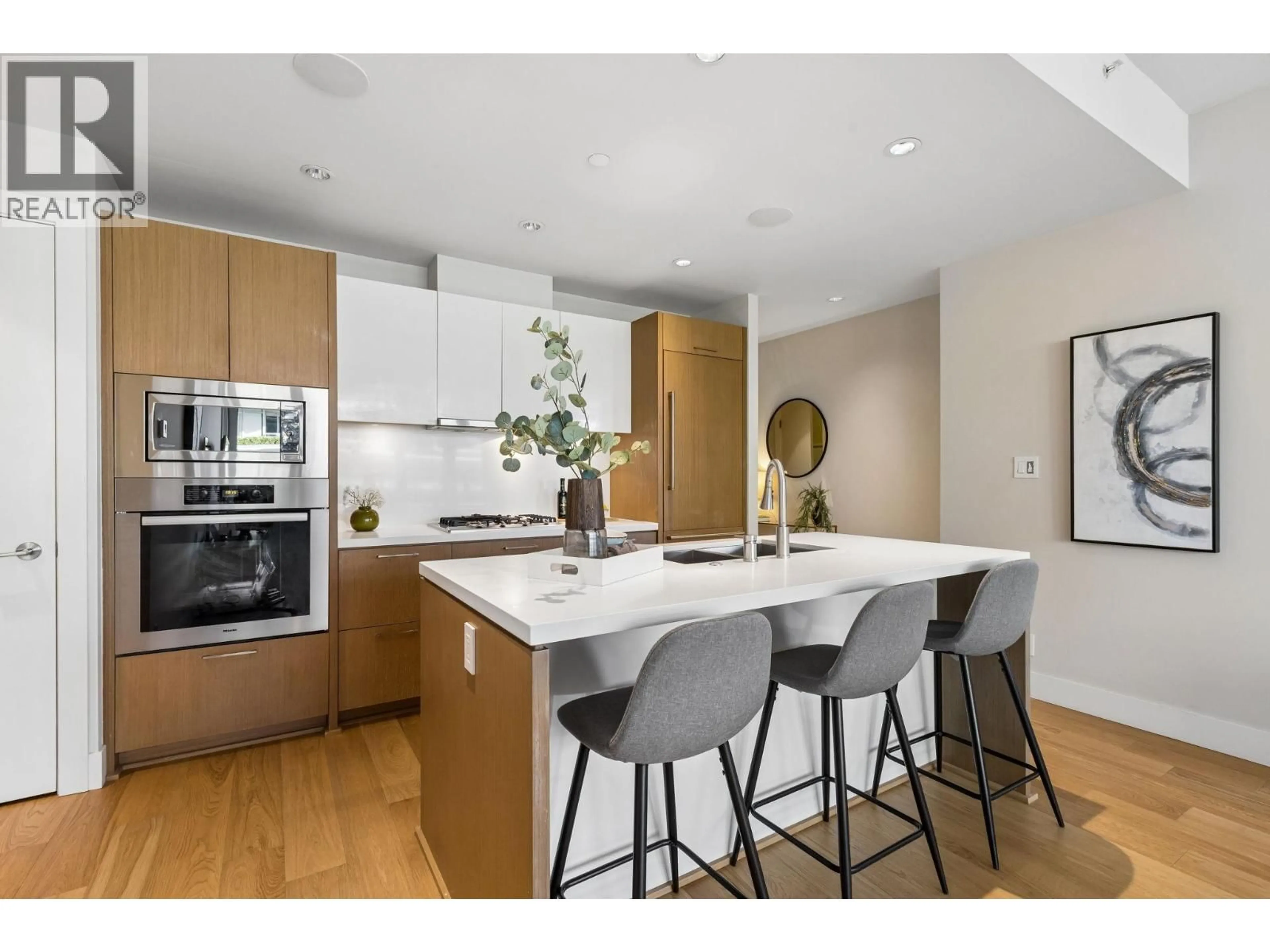 Open concept kitchen, unknown for 204 - 866 ARTHUR ERICKSON PLACE, West Vancouver British Columbia V7T0B2