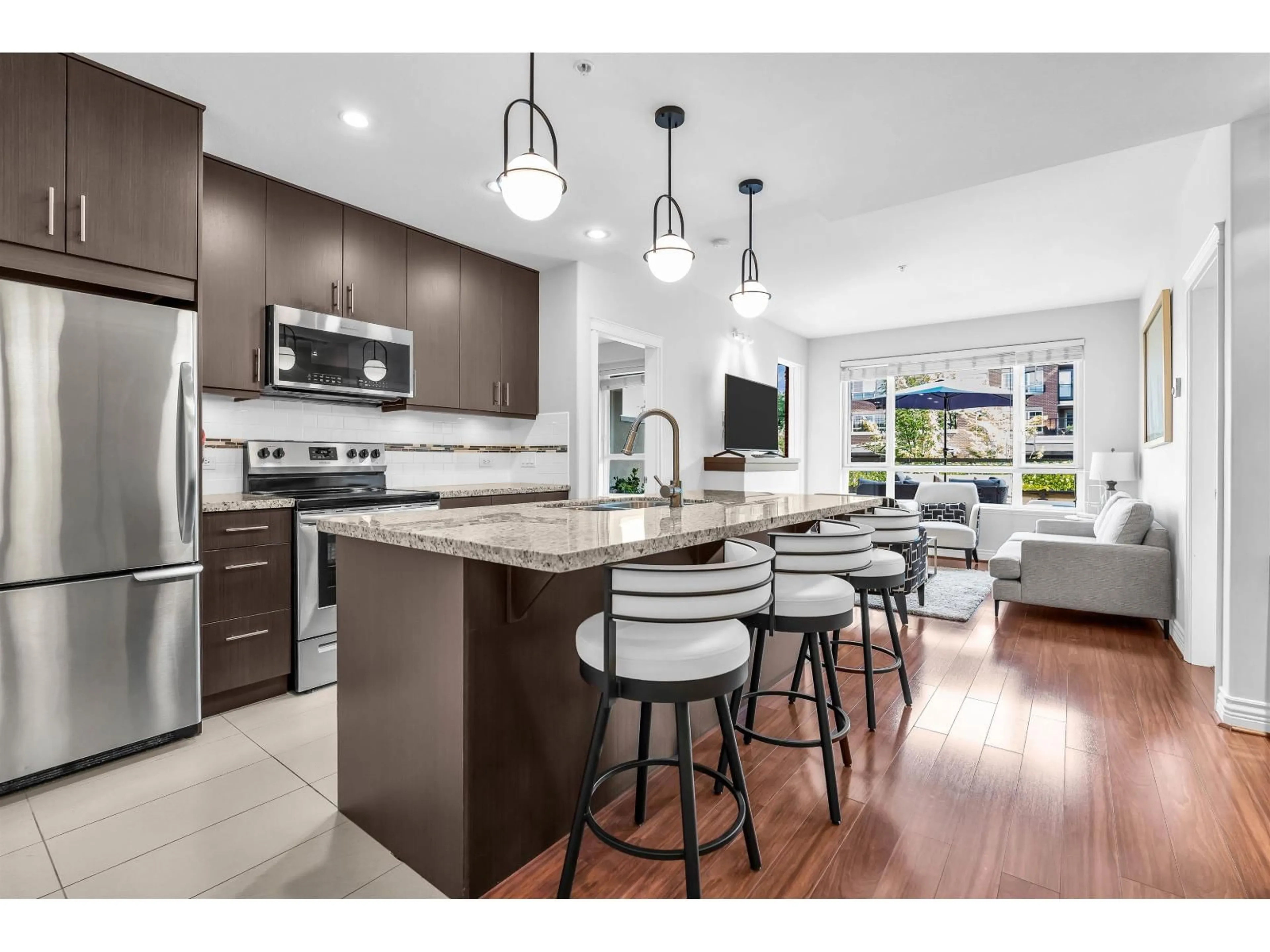 Open concept kitchen, ceramic/tile floor for 223 - 2970 KING GEORGE BOULEVARD, Surrey British Columbia V4P0E6