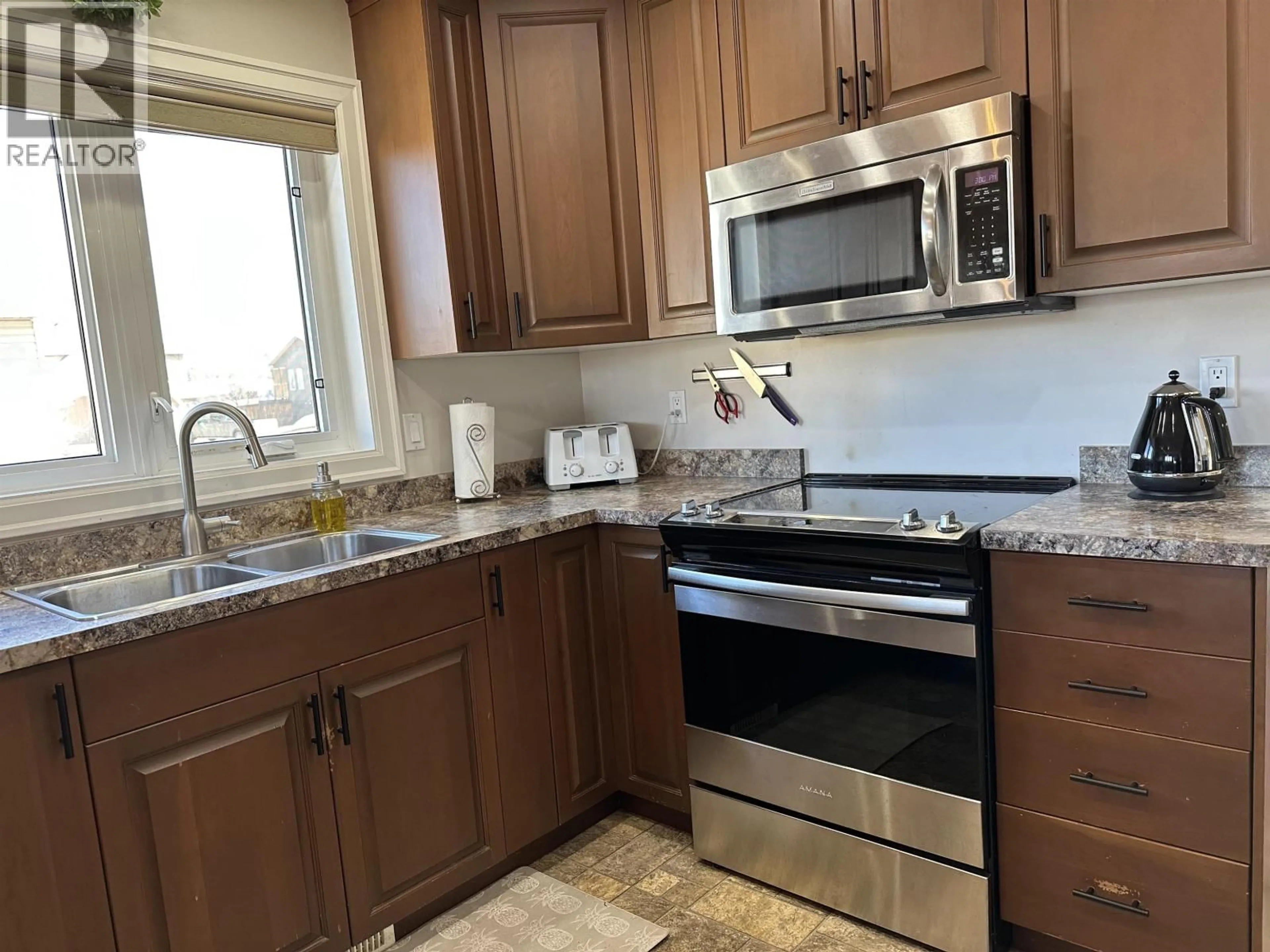 Standard kitchen, ceramic/tile floor for 8804 118A AVENUE, Fort St. John British Columbia V1J0H8