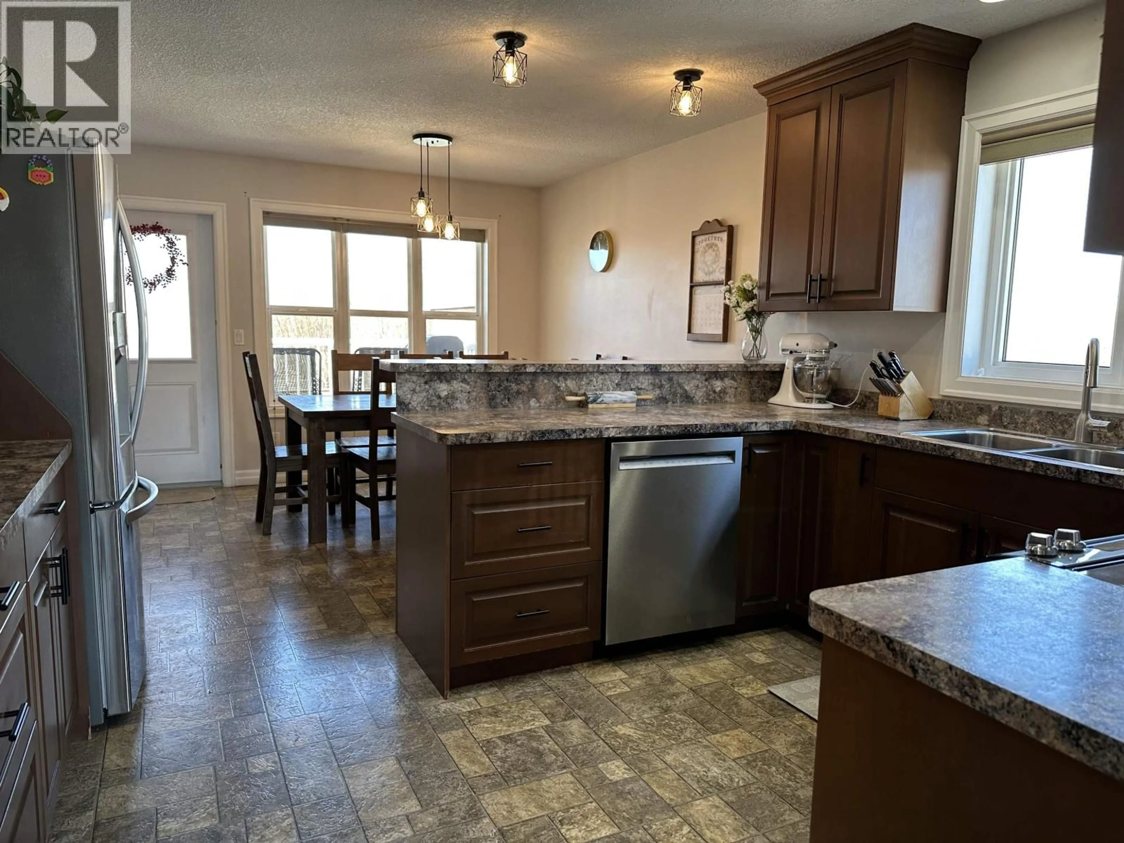 Open concept kitchen, ceramic/tile floor for 8804 118A AVENUE, Fort St. John British Columbia V1J0H8
