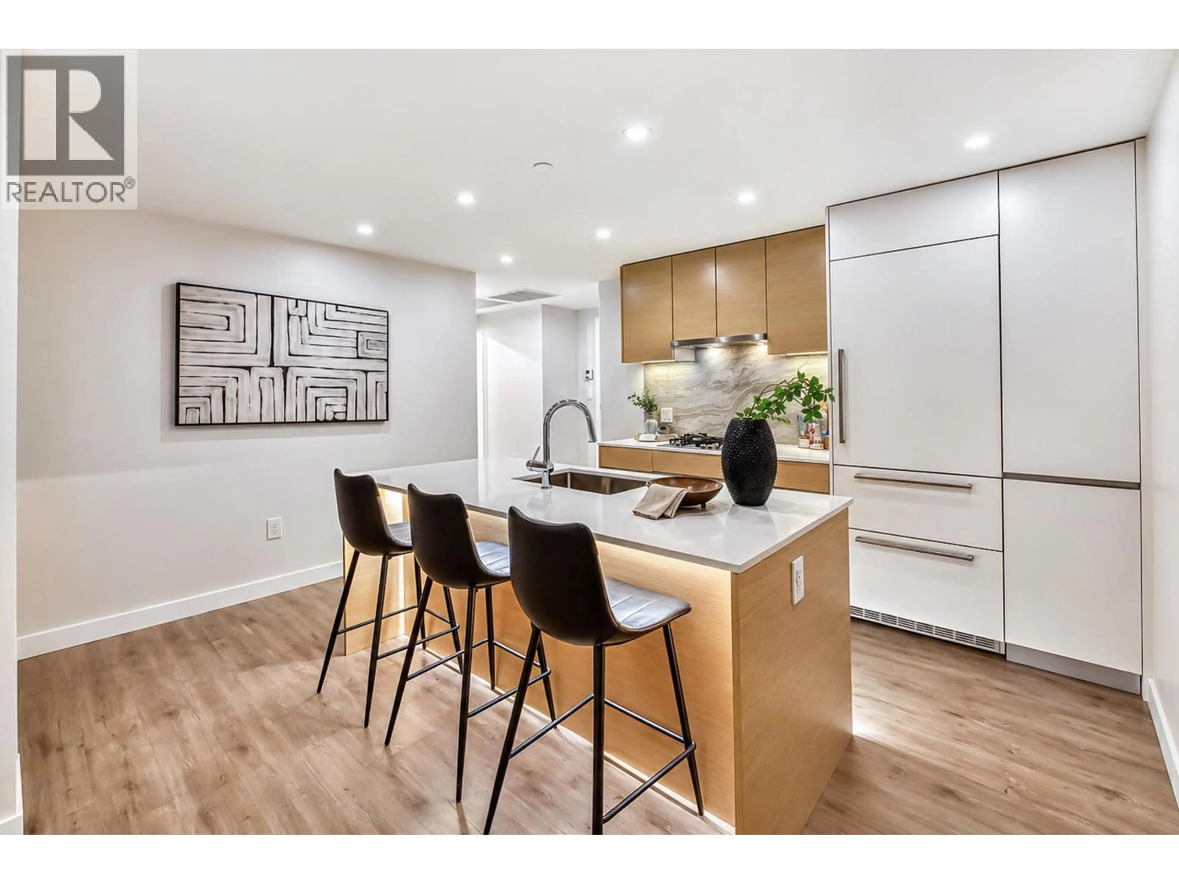 Open concept kitchen, wood/laminate floor for 1104 - 200 KLAHANIE COURT, West Vancouver British Columbia V7P0E4