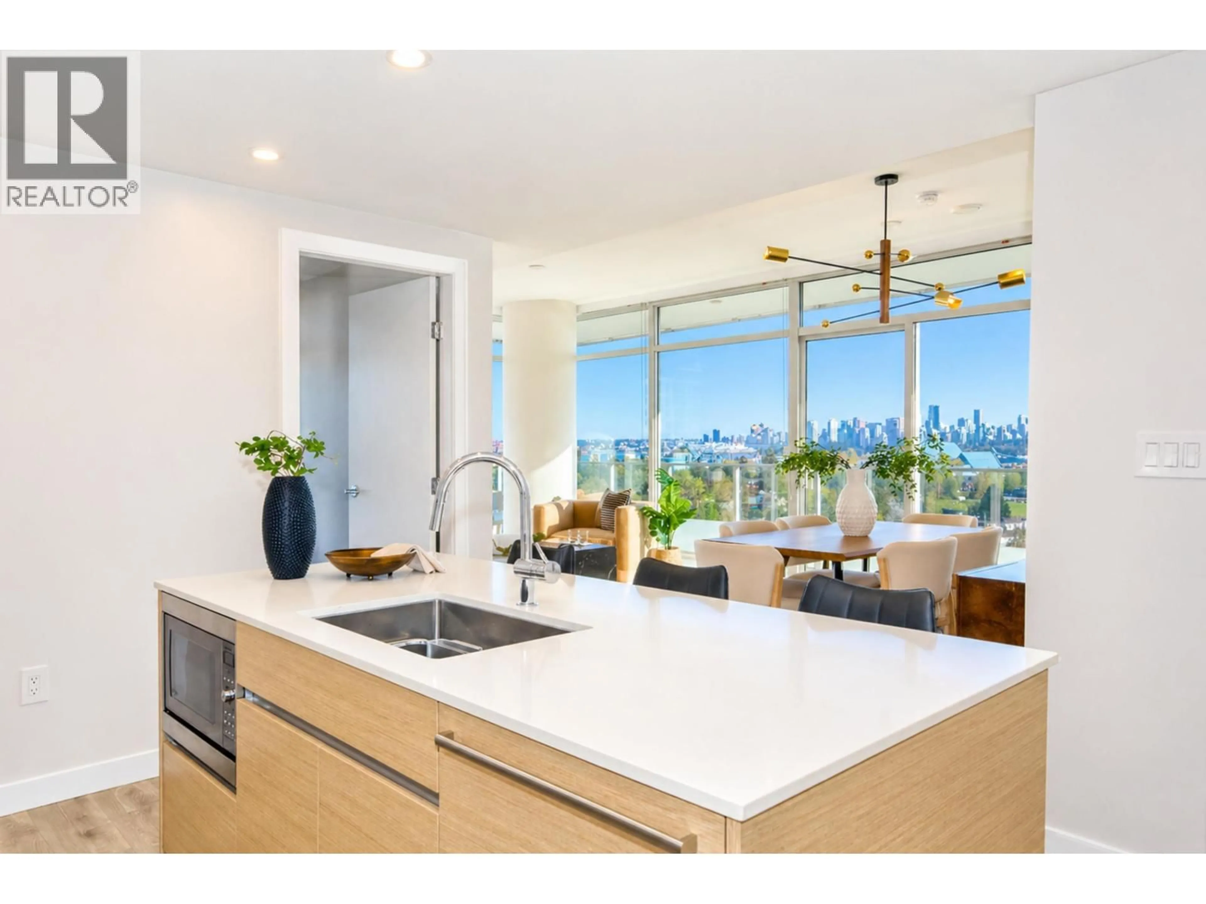 Open concept kitchen, unknown for 1104 - 200 KLAHANIE COURT, West Vancouver British Columbia V7P0E4