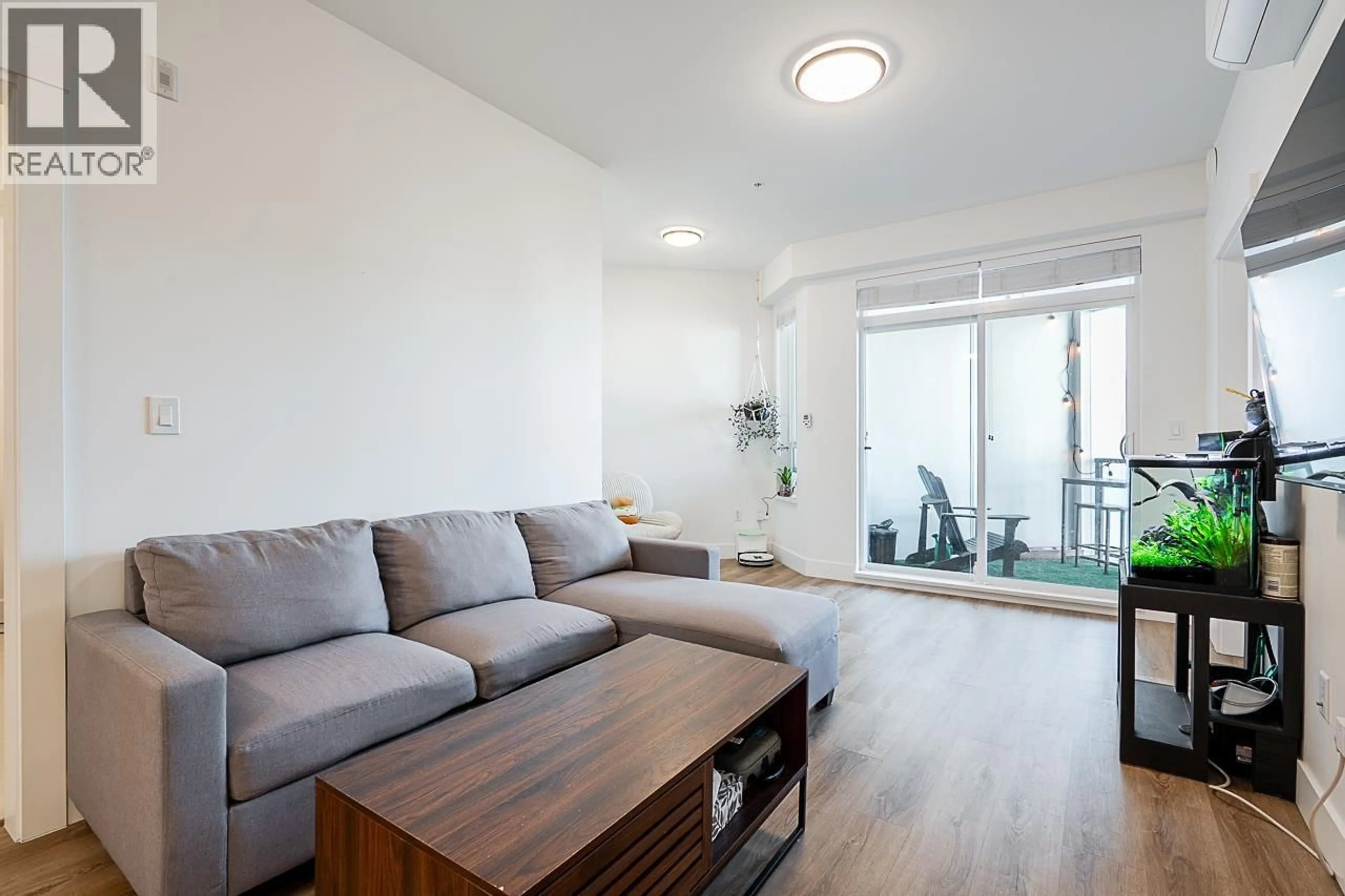 Living room with furniture, wood/laminate floor for 1608 - 2180 KELLY AVENUE, Port Coquitlam British Columbia V3C0S6