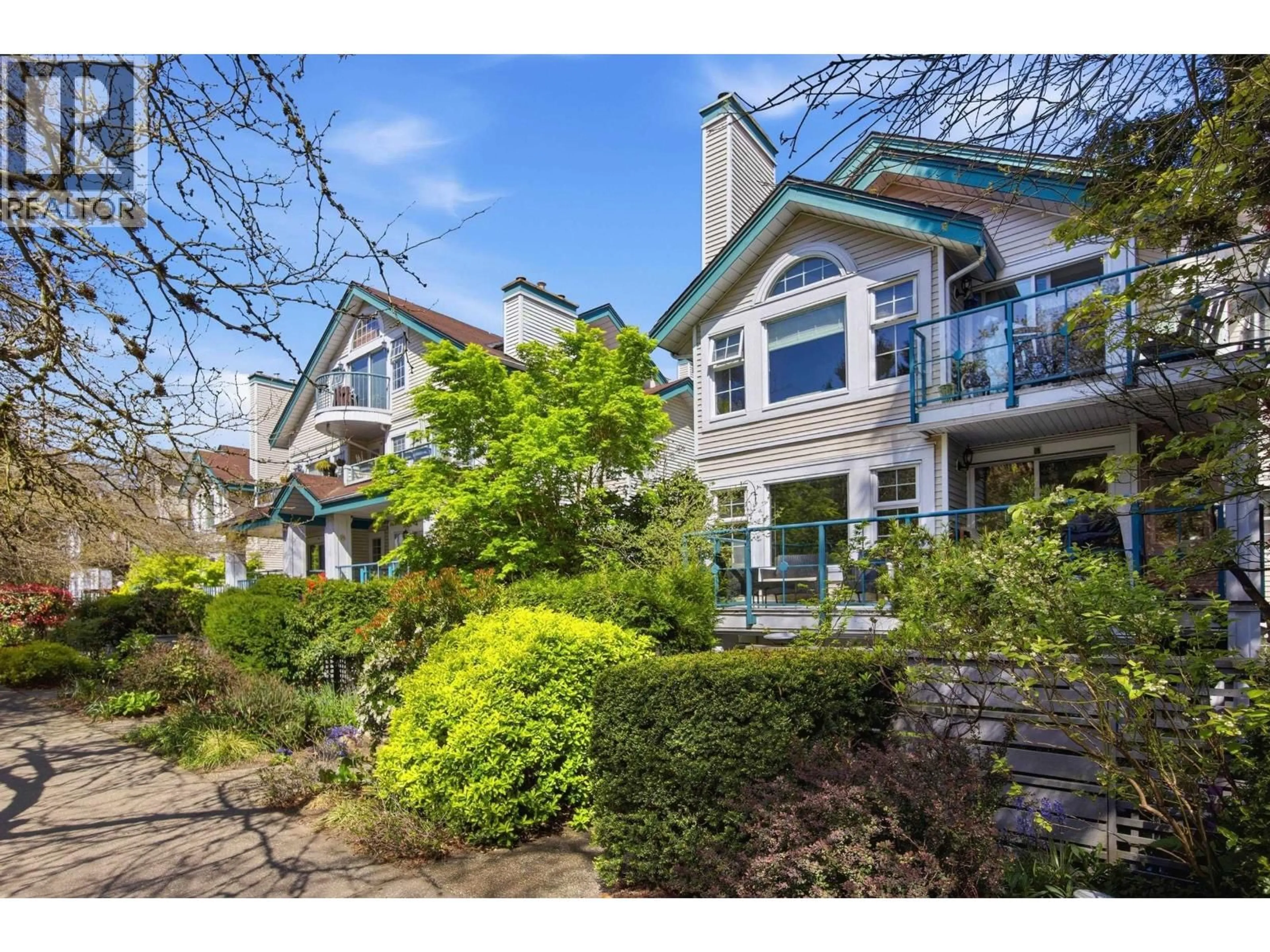 A pic from outside/outdoor area/front of a property/back of a property/a pic from drone, street for 106 - 735 15TH AVENUE, Vancouver British Columbia V5Z1R6