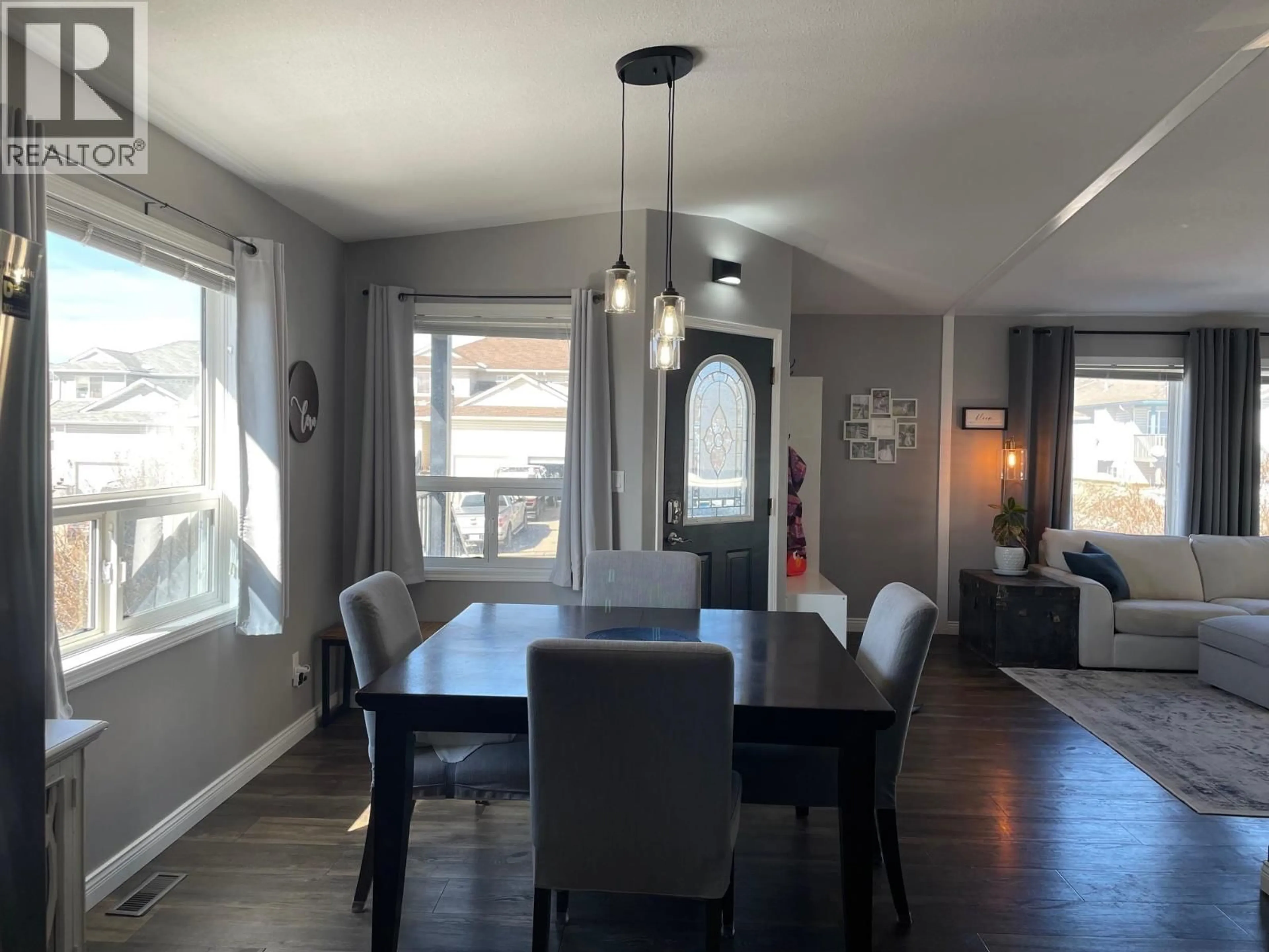 Dining room, wood/laminate floor for 5212 HALLMARK CRESCENT, Fort Nelson British Columbia V0C1R0