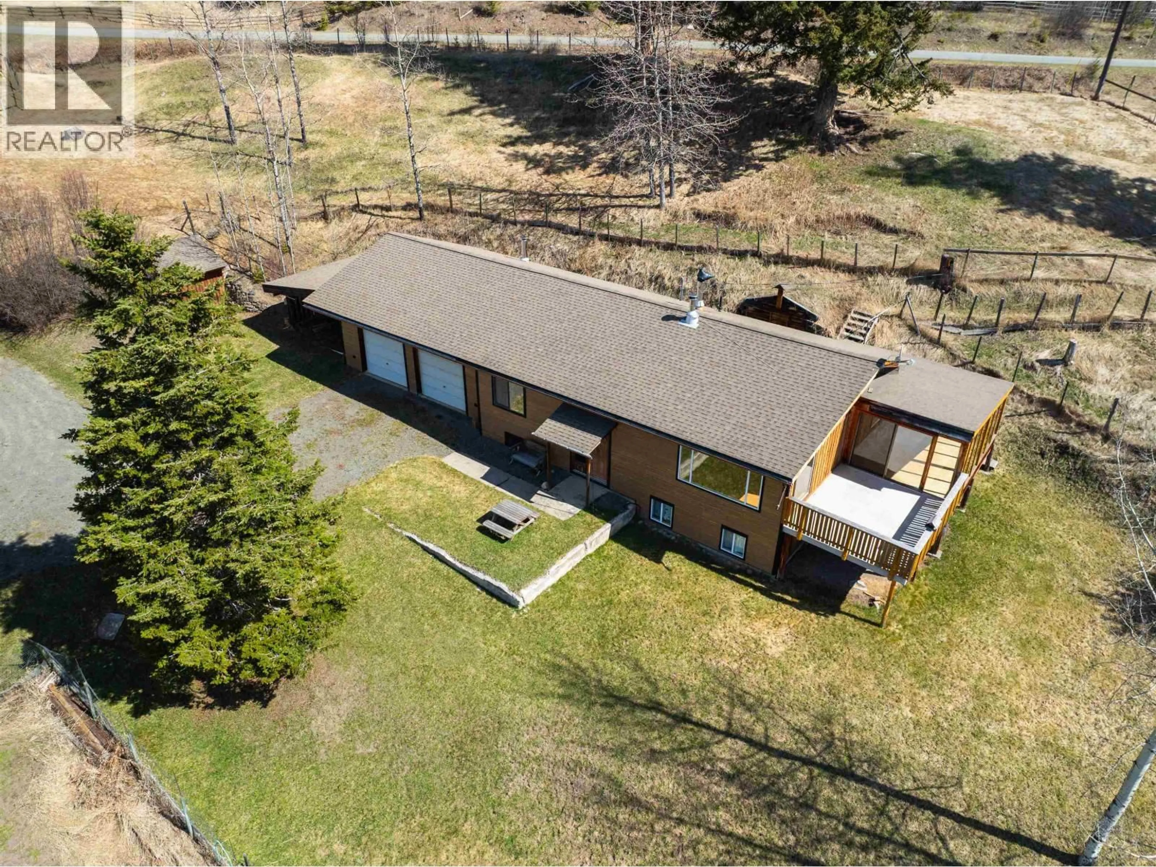 A pic from outside/outdoor area/front of a property/back of a property/a pic from drone, building for 7115 CONNIE ROAD, Bridge Lake British Columbia V0K1X2