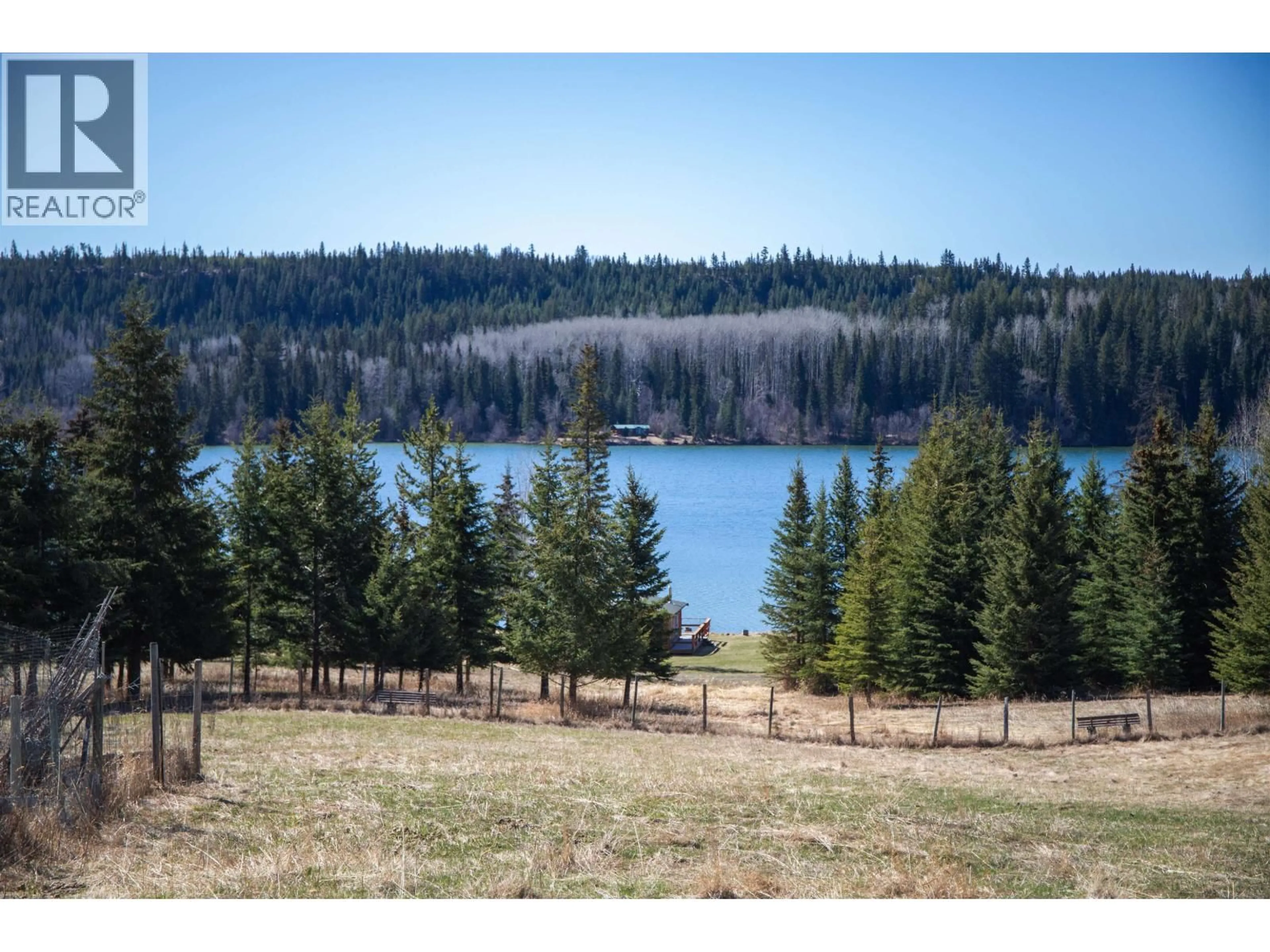 A pic from outside/outdoor area/front of a property/back of a property/a pic from drone, water/lake/river/ocean view for 7115 CONNIE ROAD, Bridge Lake British Columbia V0K1X2