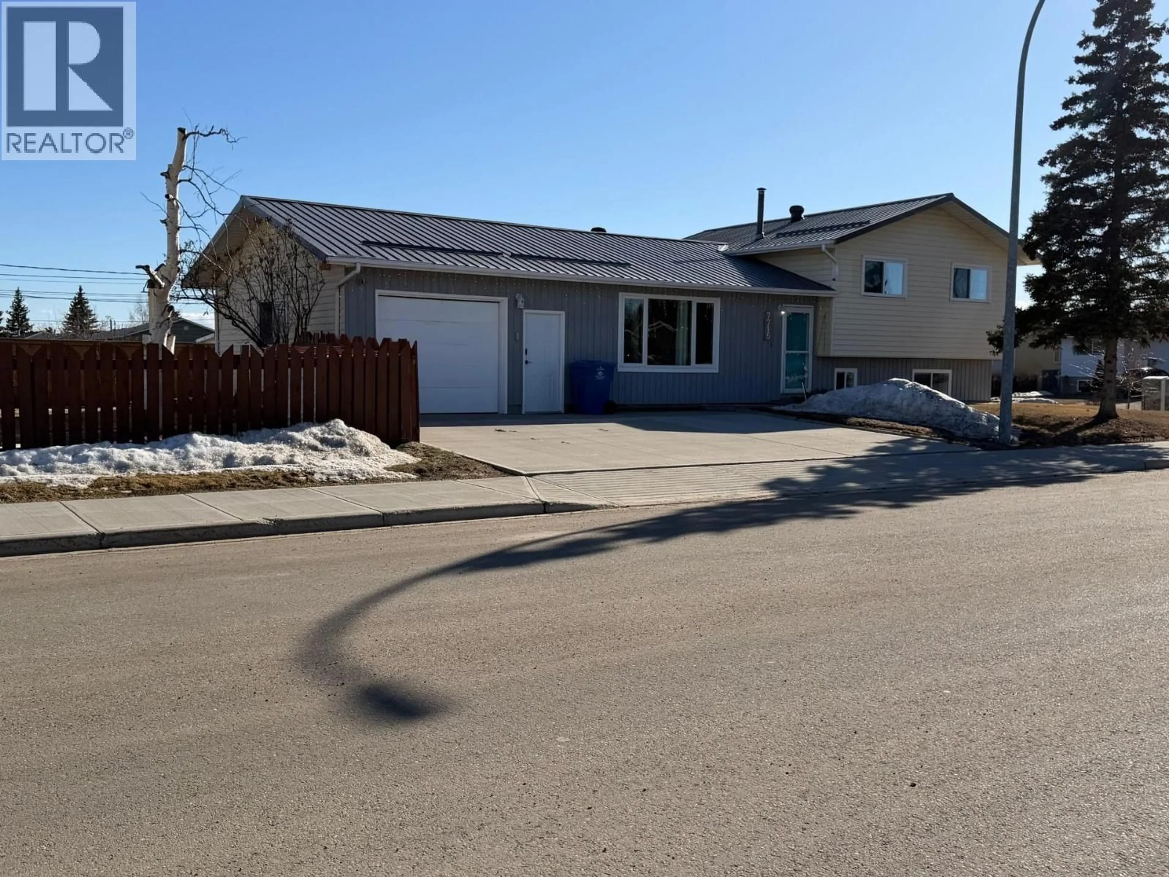A pic from outside/outdoor area/front of a property/back of a property/a pic from drone, street for 7715 91 AVENUE, Fort St. John British Columbia V1J4V3