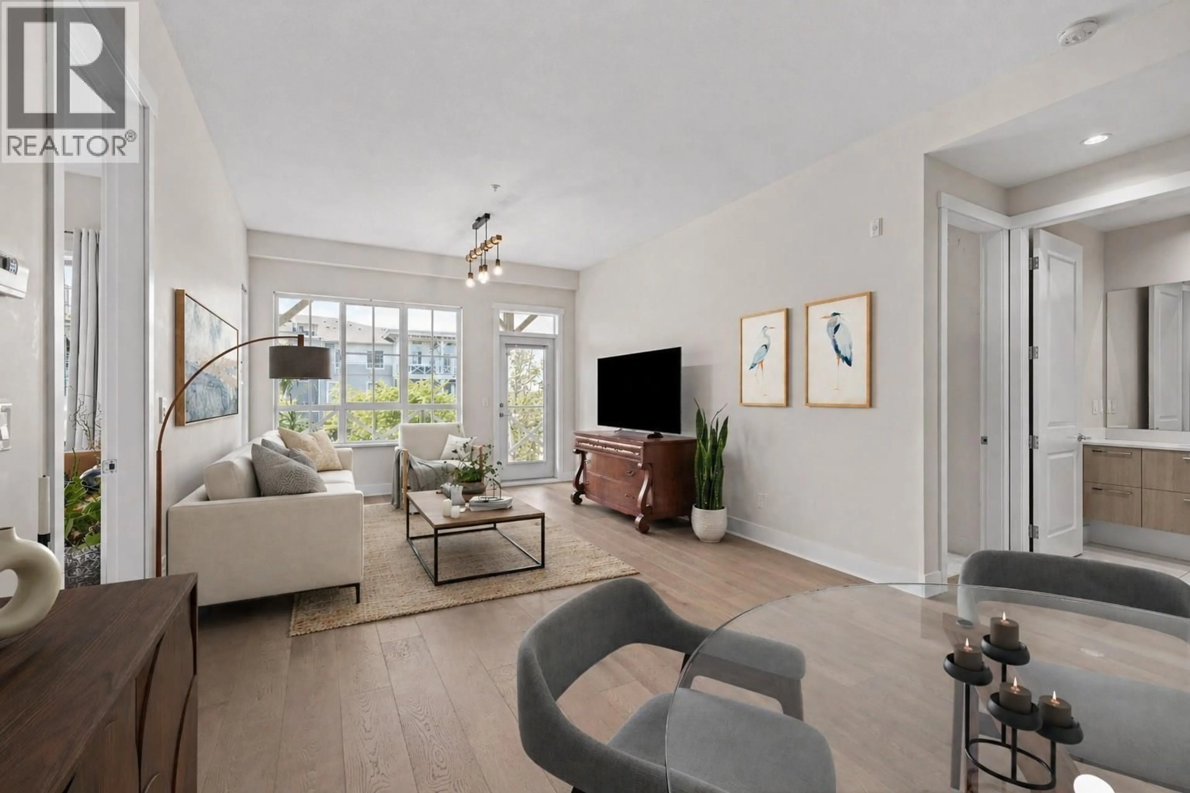 Living room with furniture, unknown for 217 - 5535 ADMIRAL WAY, Delta British Columbia V4K0E3