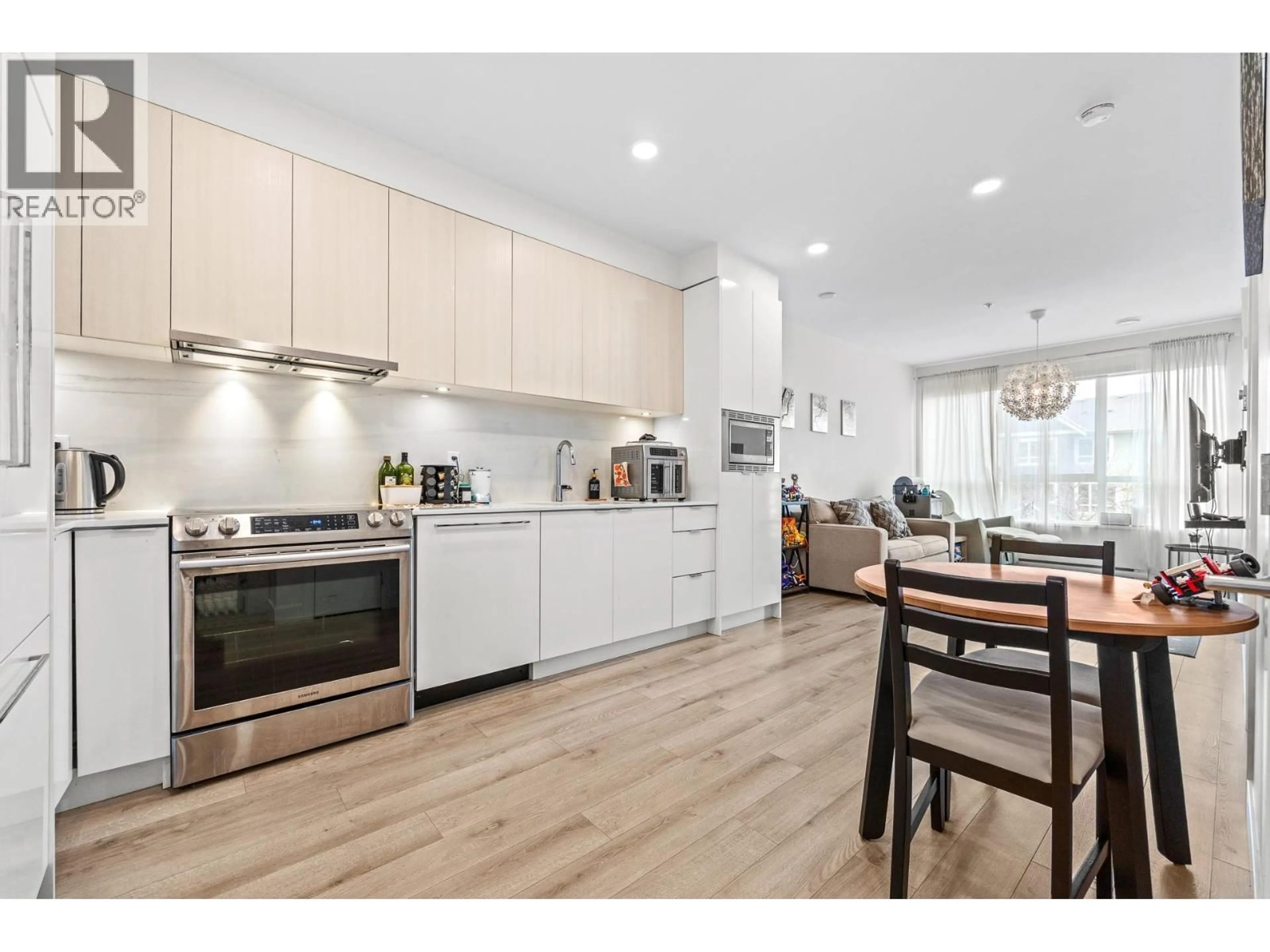 Open concept kitchen, wood/laminate floor for 215 - 1892 STARLING DRIVE, Tsawwassen British Columbia V4M0C7