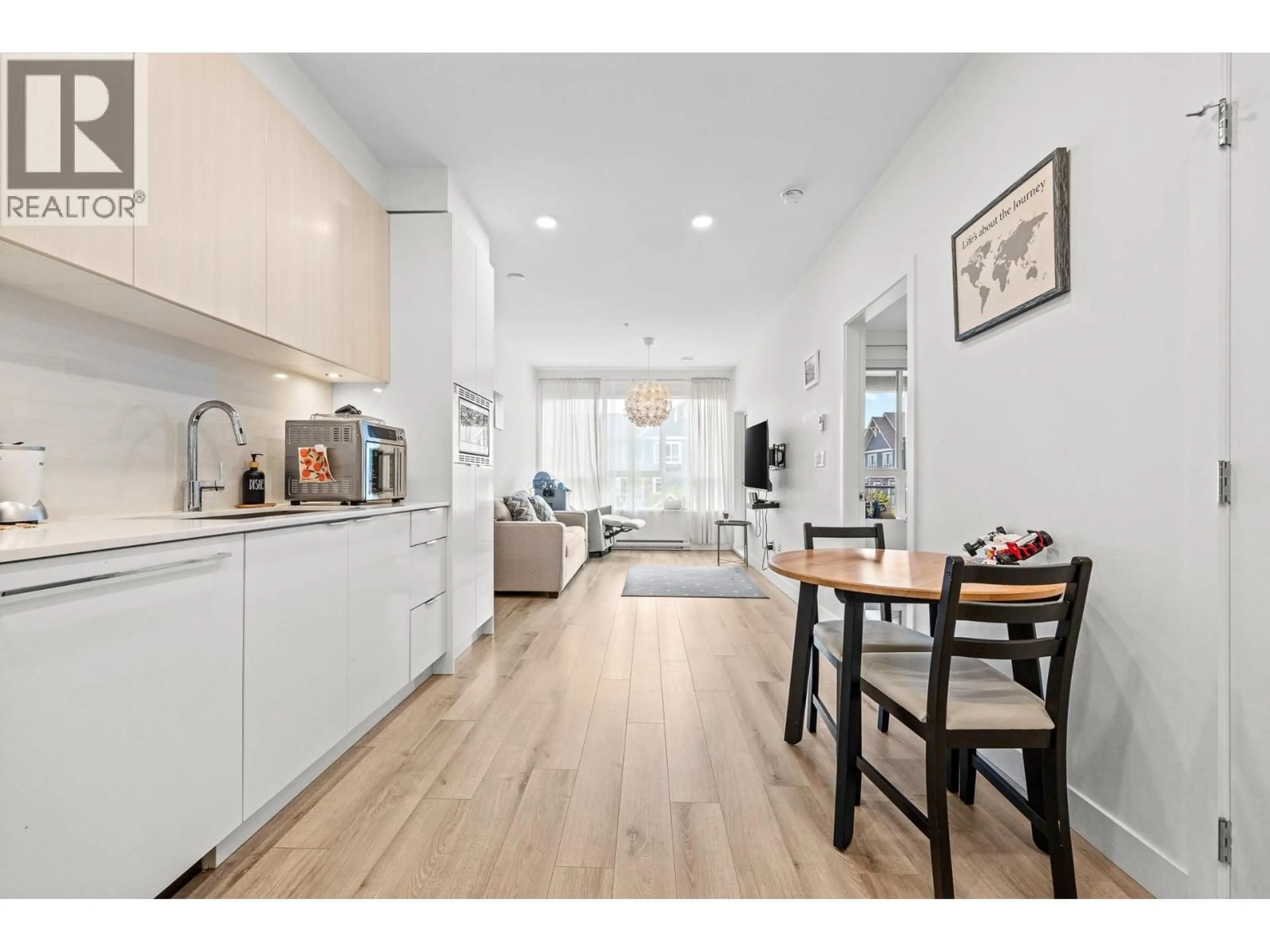 Open concept kitchen, wood/laminate floor for 215 - 1892 STARLING DRIVE, Tsawwassen British Columbia V4M0C7