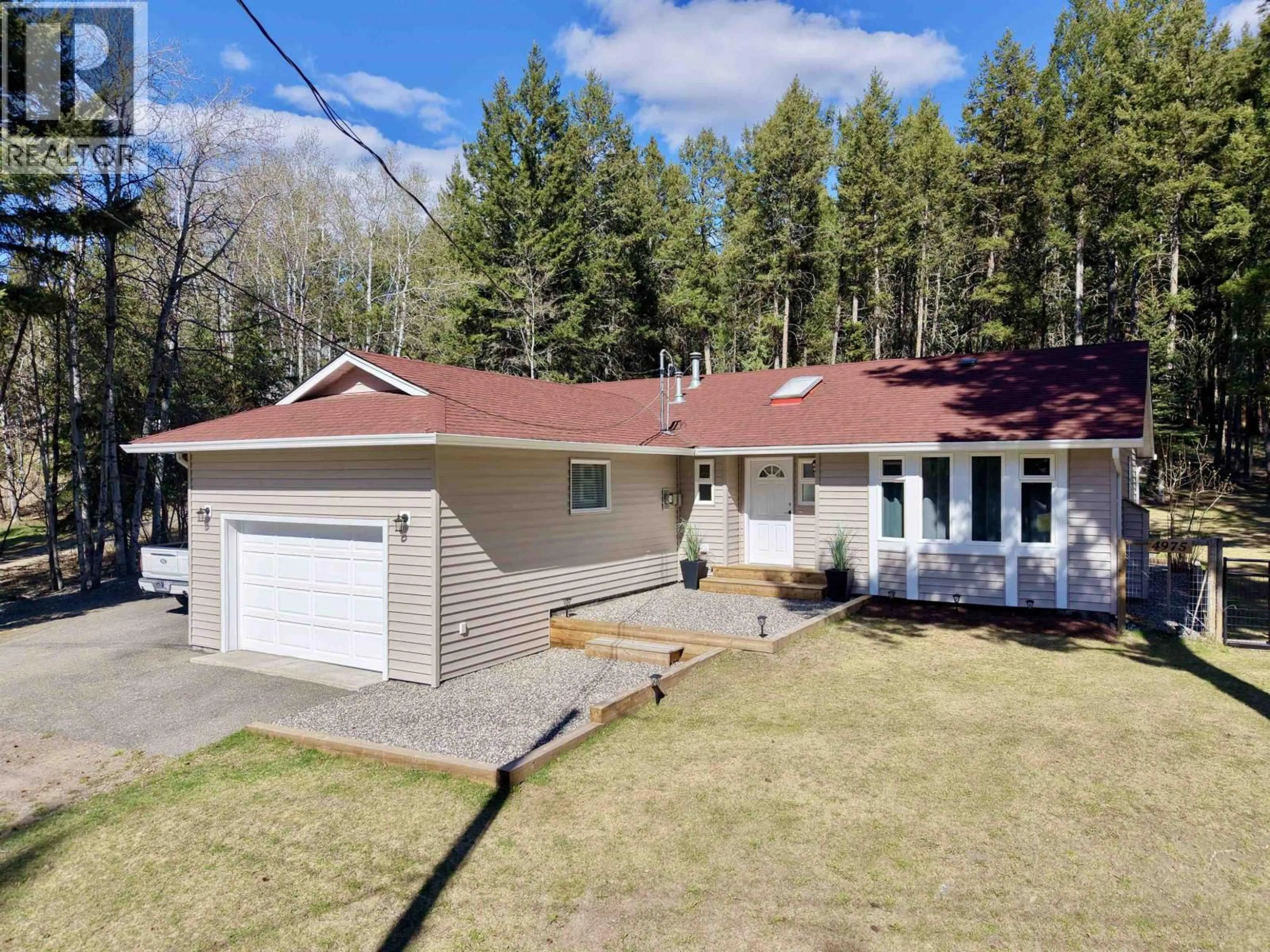 A pic from outside/outdoor area/front of a property/back of a property/a pic from drone, street for 4975 GLOINNZUN DRIVE, 108 Mile Ranch British Columbia V0K2Z0
