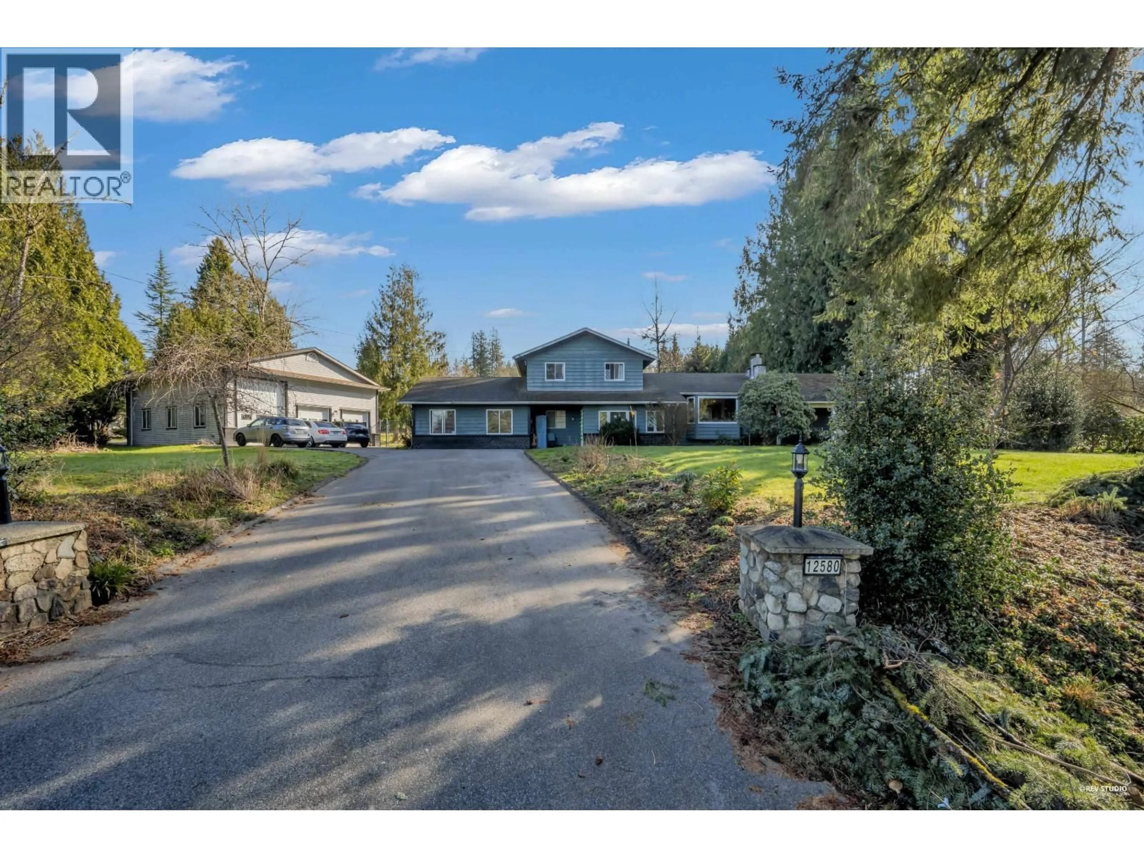 A pic from outside/outdoor area/front of a property/back of a property/a pic from drone, street for 12580 243 STREET, Maple Ridge British Columbia V2W1C4
