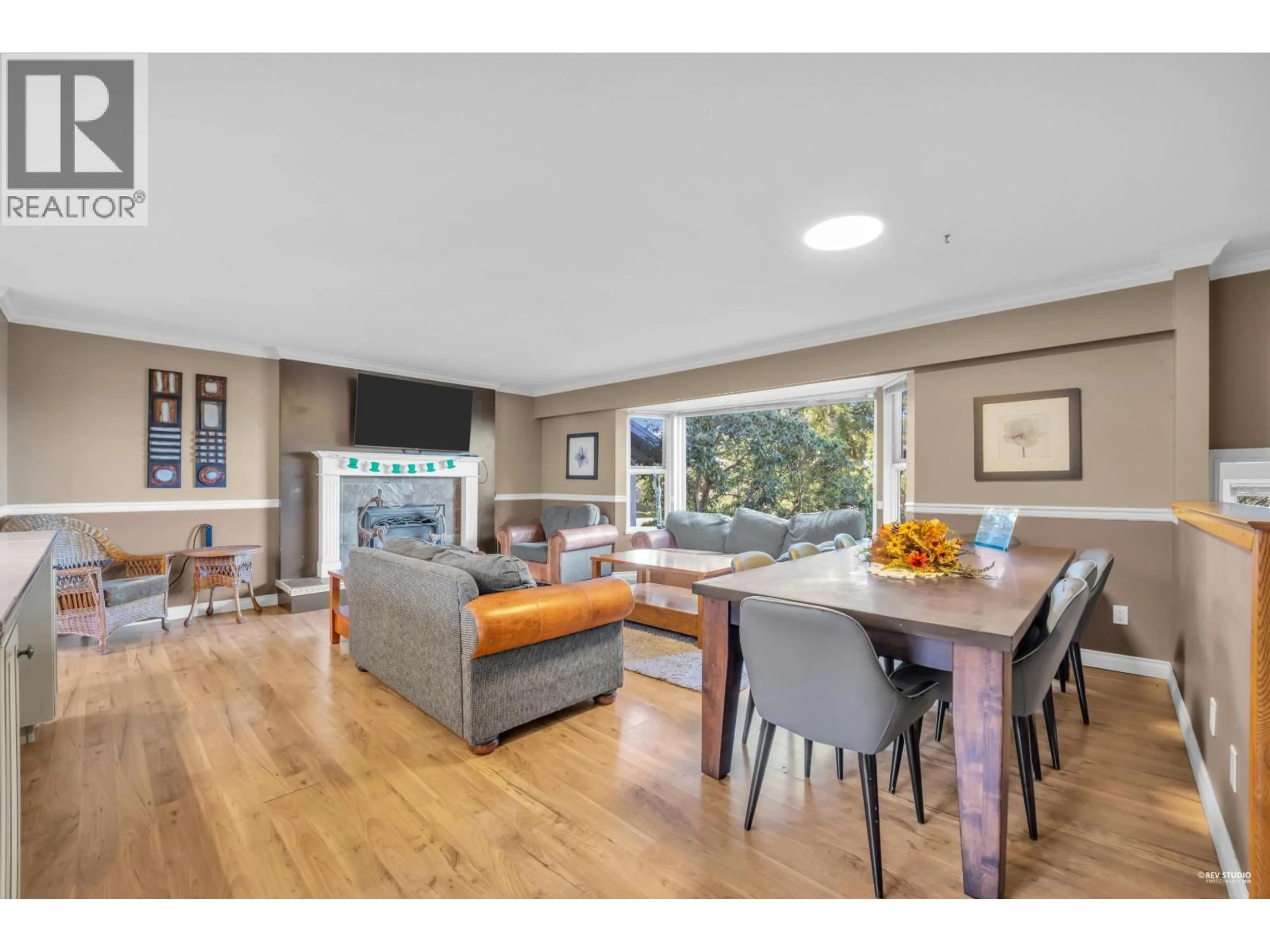 Living room with furniture, wood/laminate floor for 12580 243 STREET, Maple Ridge British Columbia V2W1C4