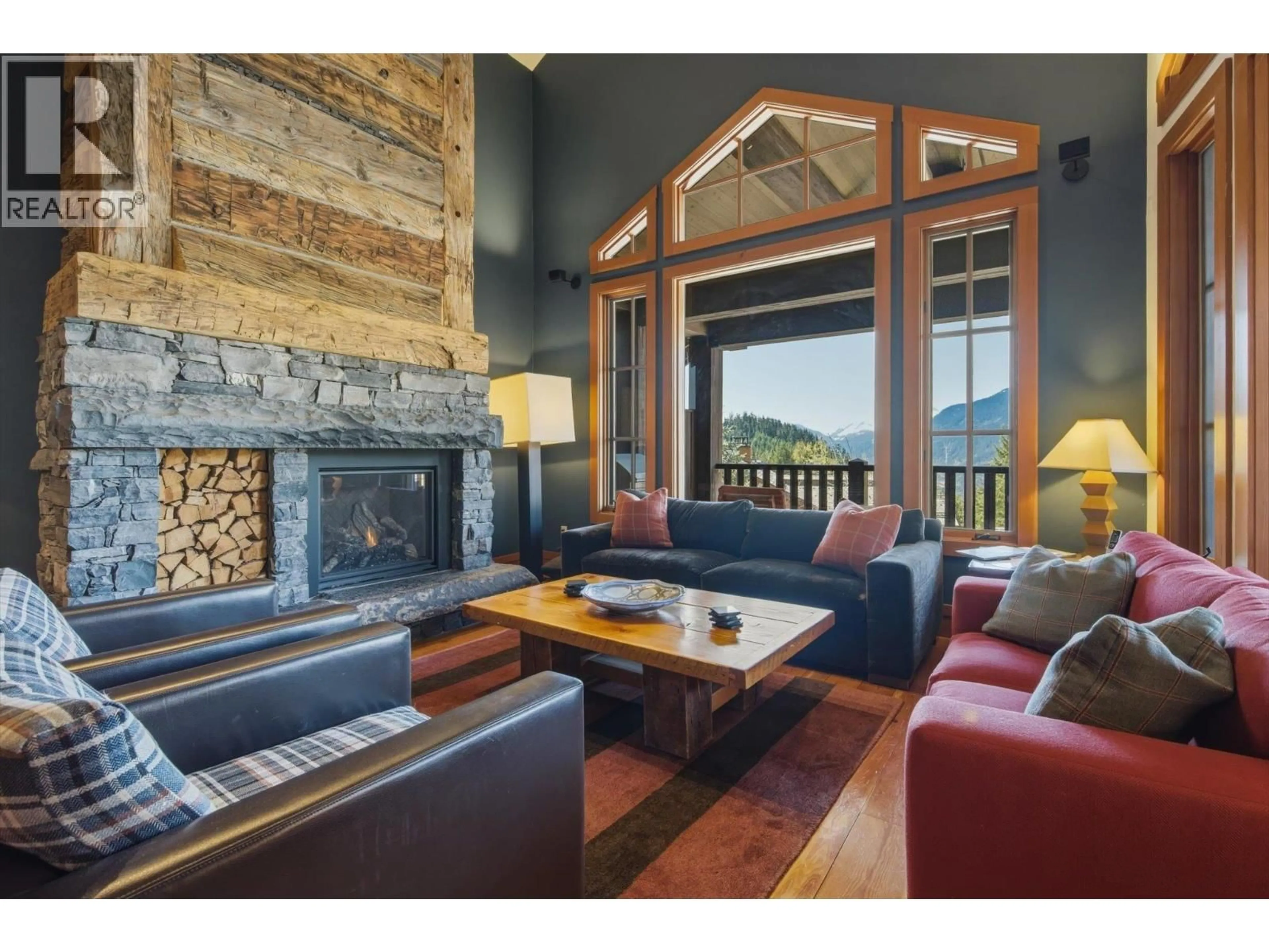 Living room with furniture, wood/laminate floor for 12C - 2300 NORDIC DRIVE, Whistler British Columbia V8E0A6