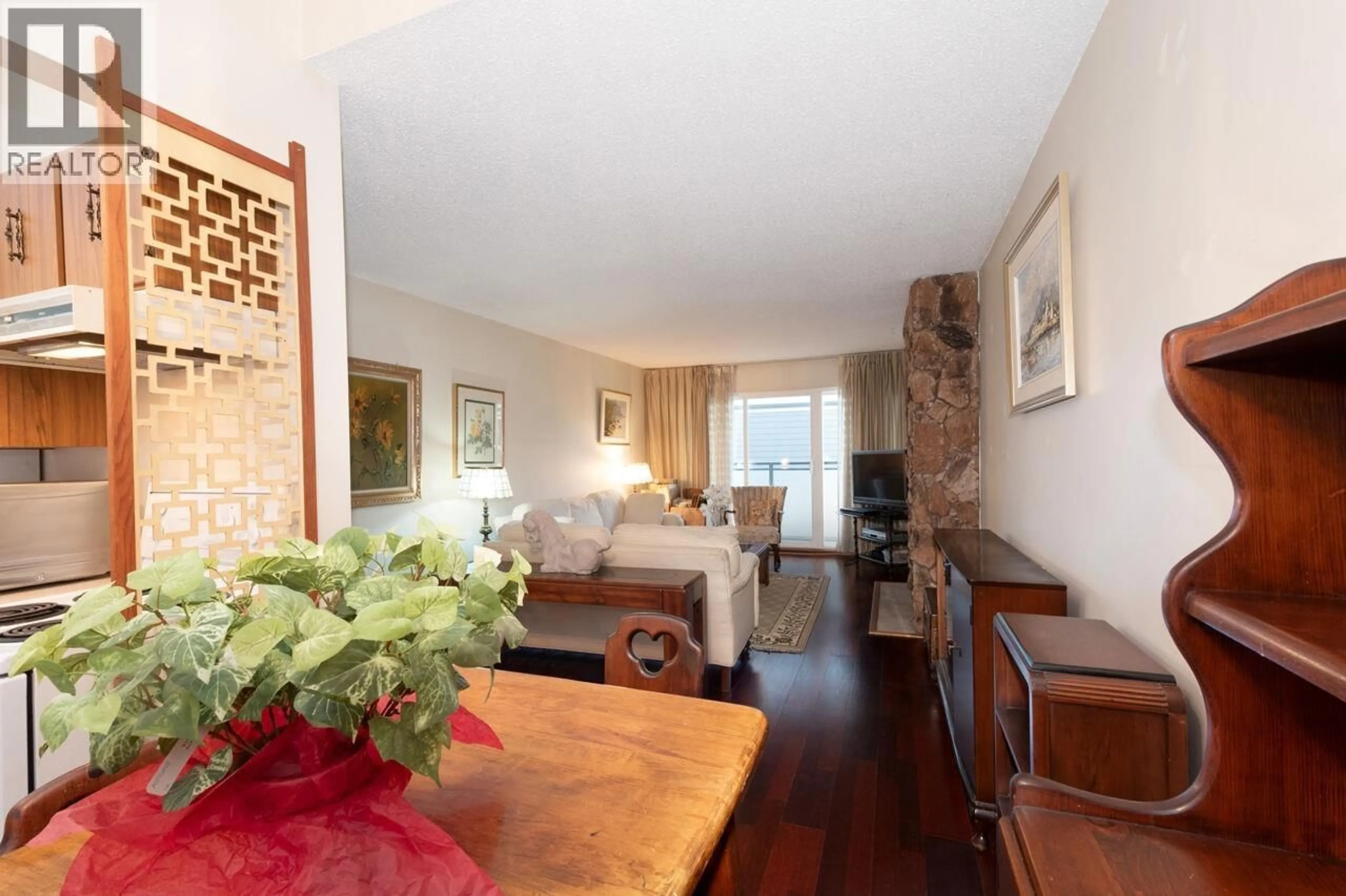 Living room with furniture, wood/laminate floor for 302 - 2250 OXFORD STREET, Vancouver British Columbia V5L1G1