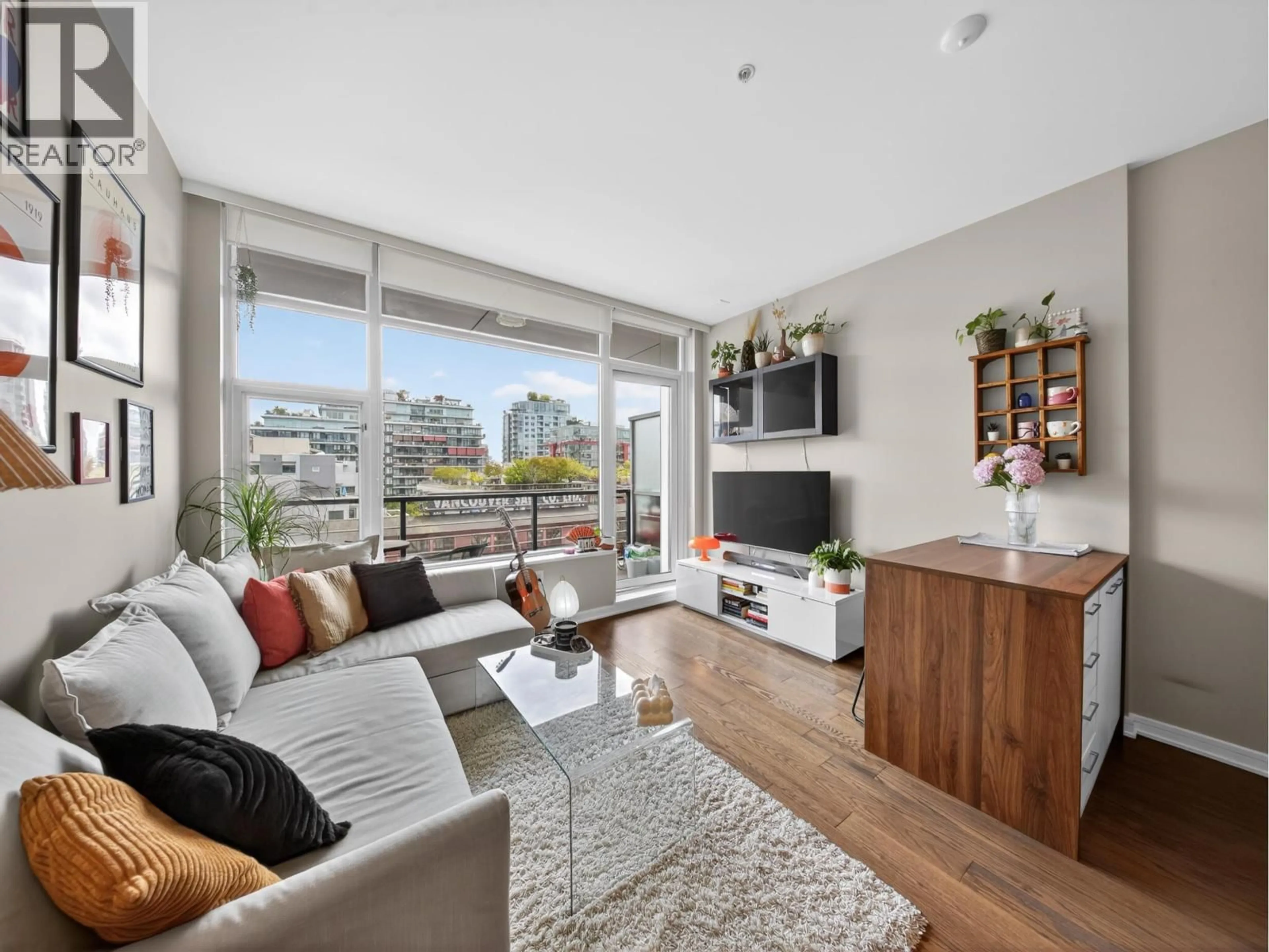 Living room with furniture, wood/laminate floor for 704 - 123 1ST AVENUE, Vancouver British Columbia V5Y0E2