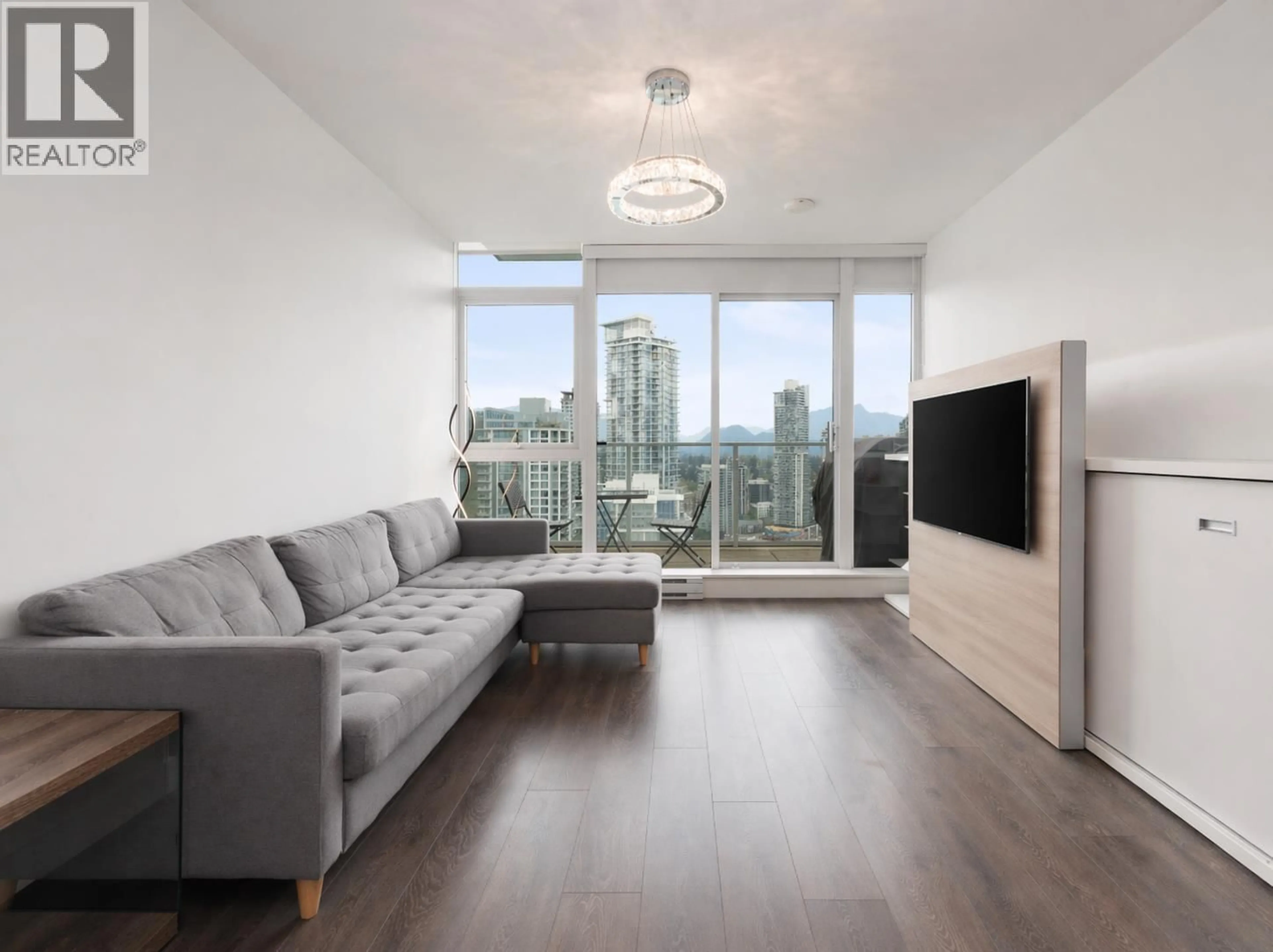 Living room with furniture, wood/laminate floor for 3601 - 657 WHITING WAY, Coquitlam British Columbia V3J0J6