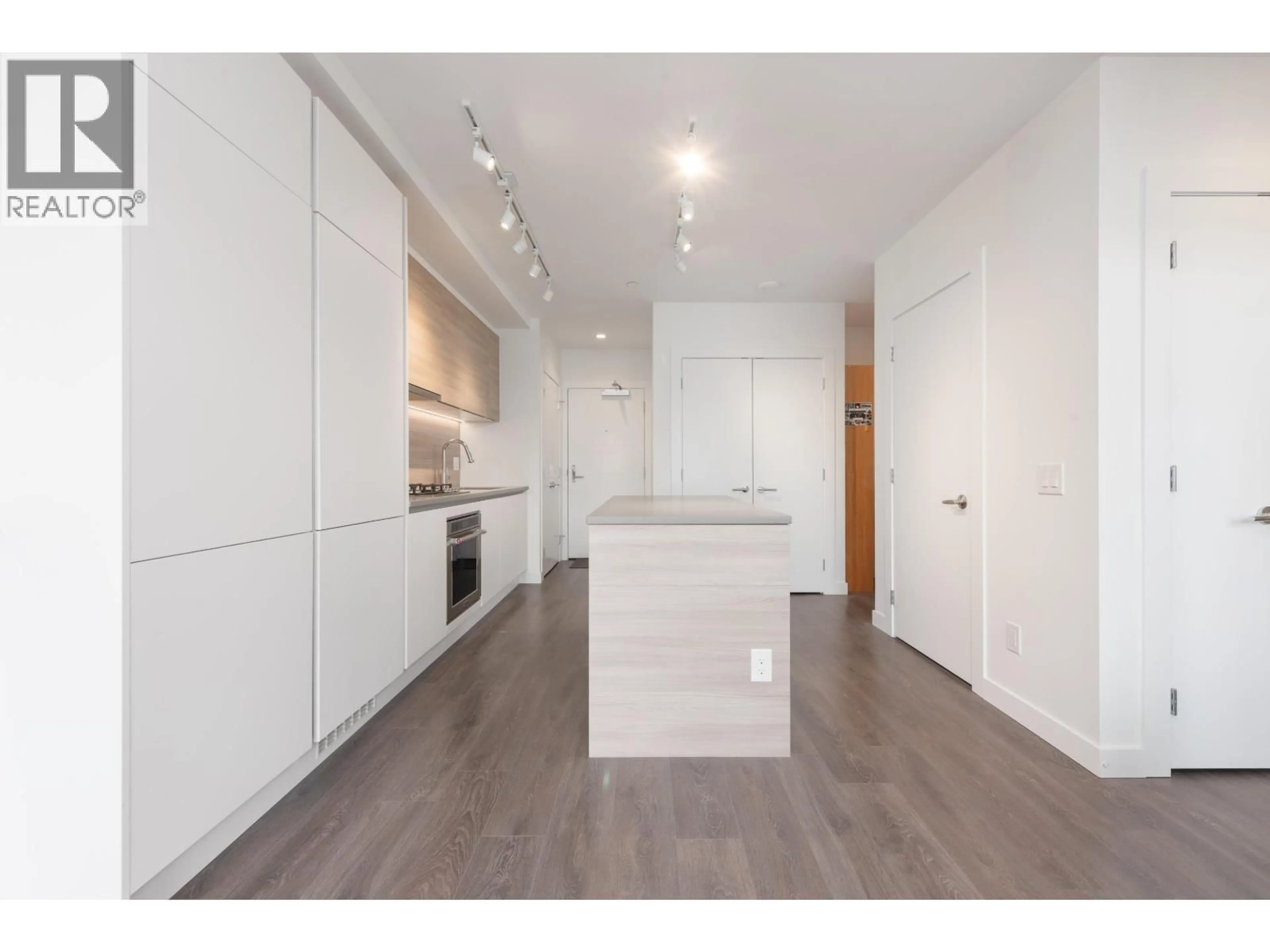 Open concept kitchen, wood/laminate floor for 3601 - 657 WHITING WAY, Coquitlam British Columbia V3J0J6