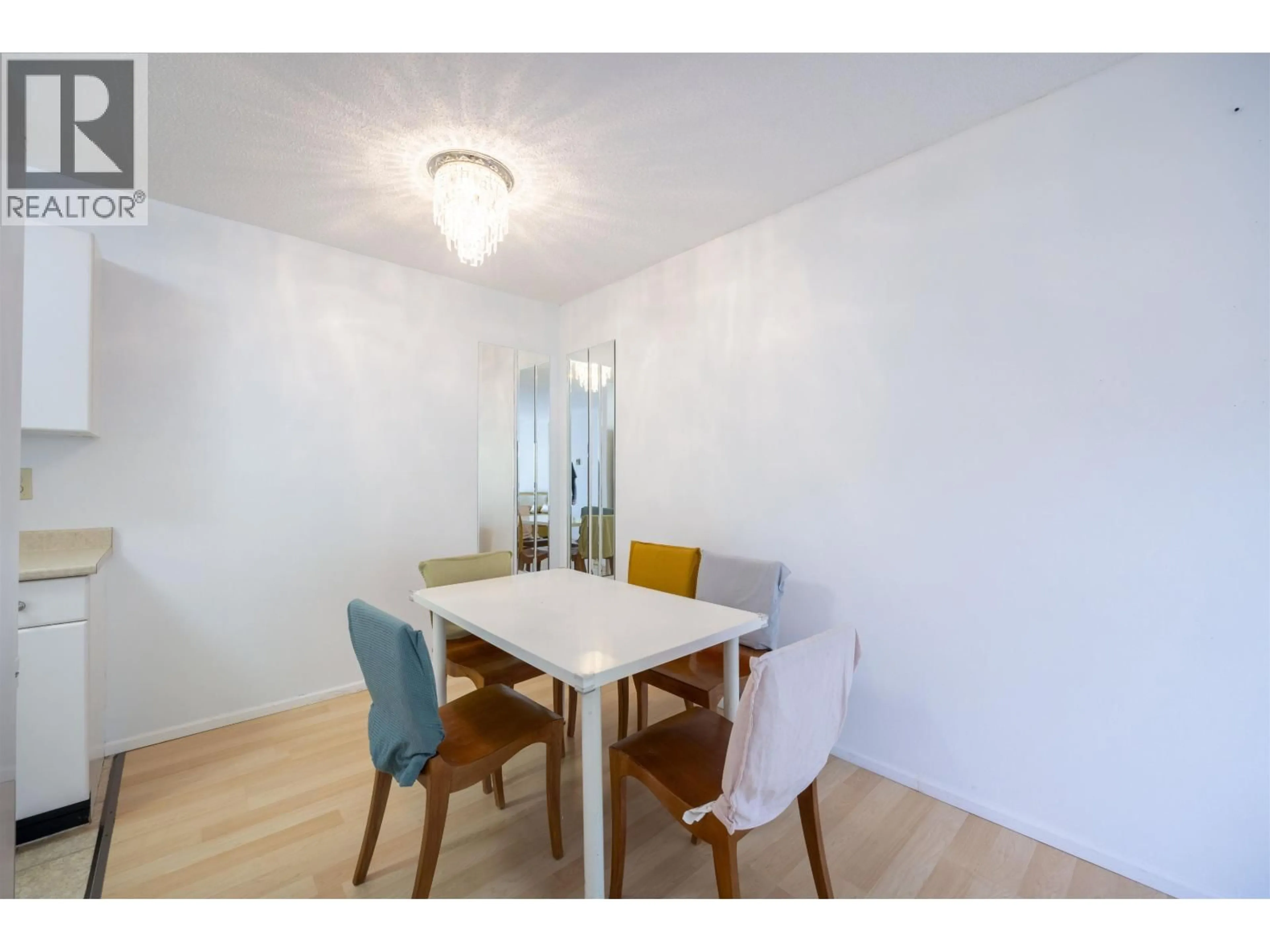 Dining room, wood/laminate floor for 203 - 1195 PIPELINE ROAD, Coquitlam British Columbia V3B6J5