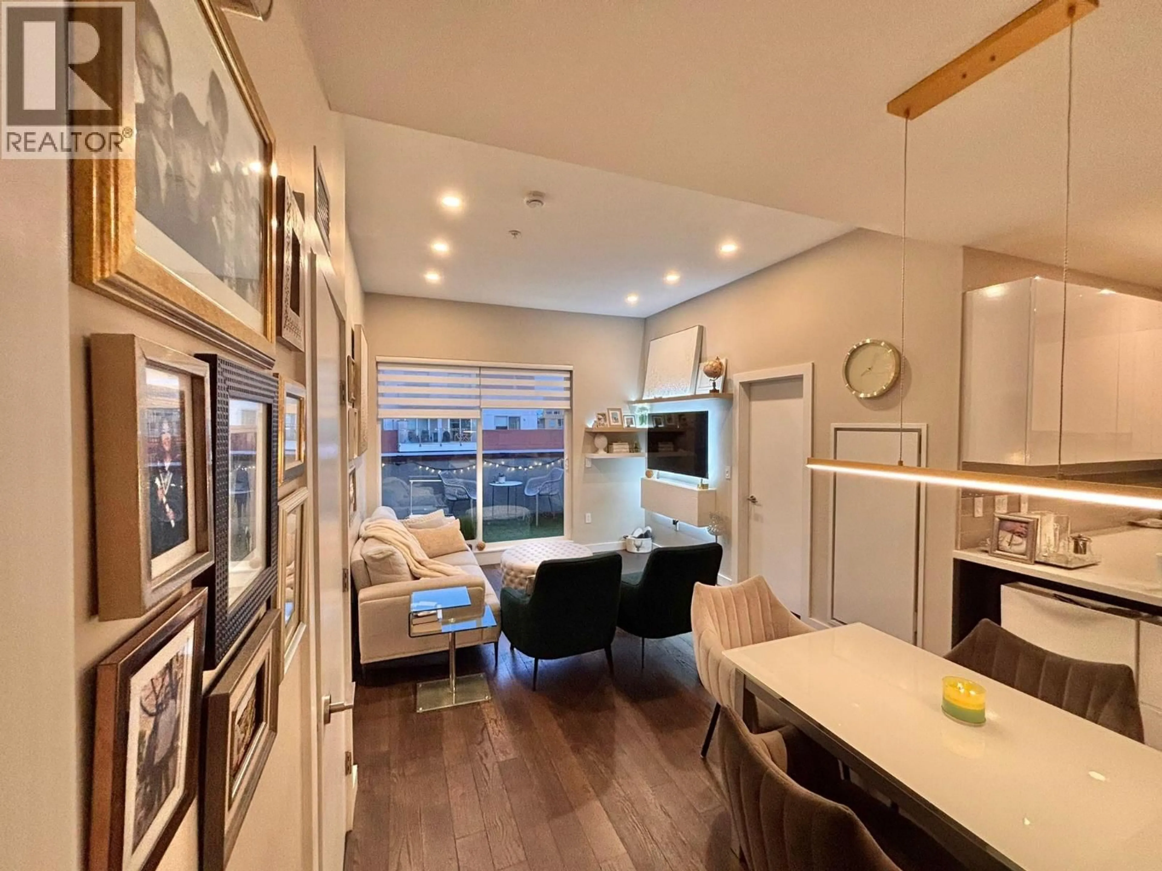 Open concept kitchen, wood/laminate floor for 602 - 5399 CEDARBRIDGE WAY, Richmond British Columbia V6X0L6