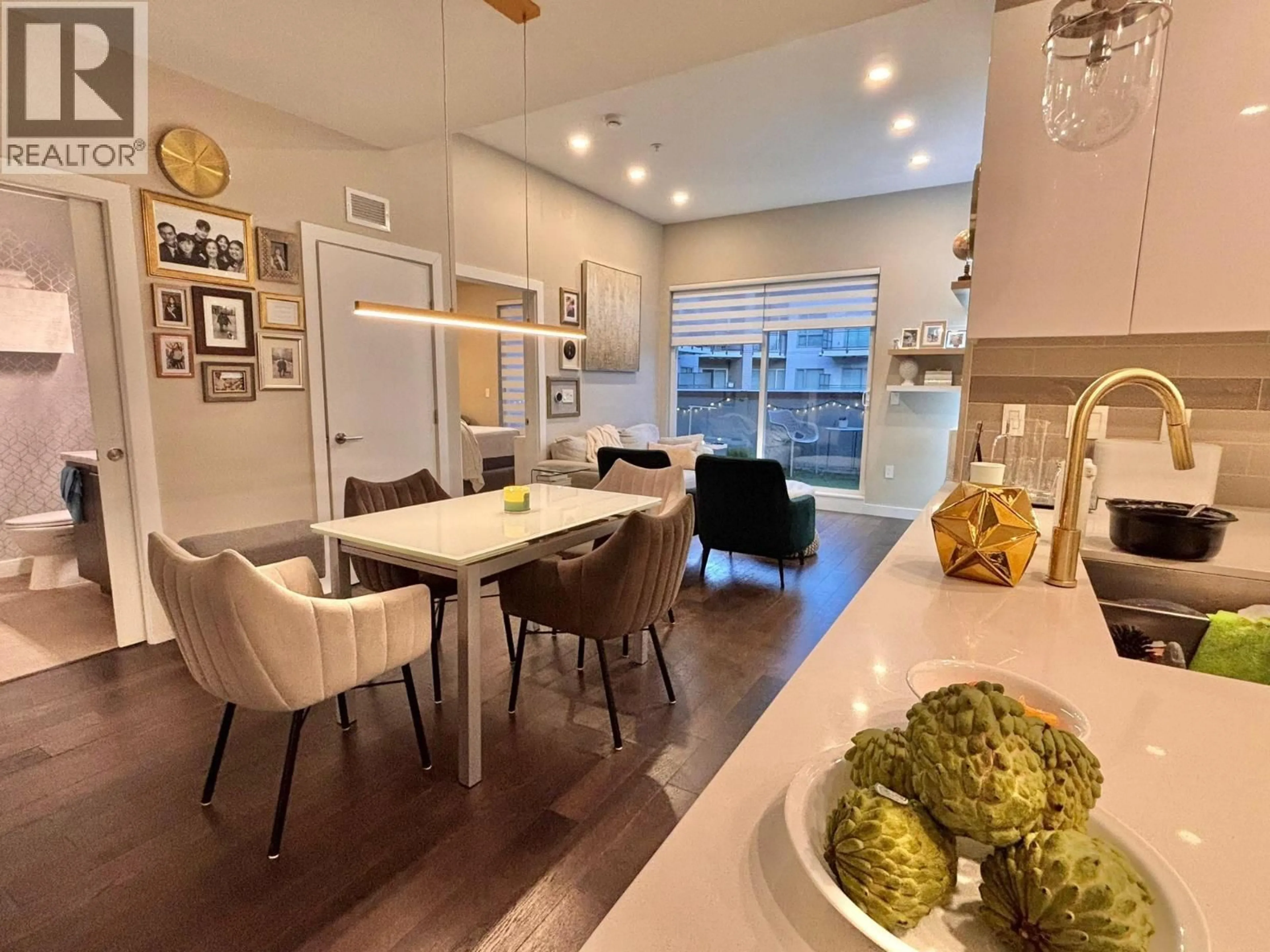 Open concept kitchen, wood/laminate floor for 602 - 5399 CEDARBRIDGE WAY, Richmond British Columbia V6X0L6