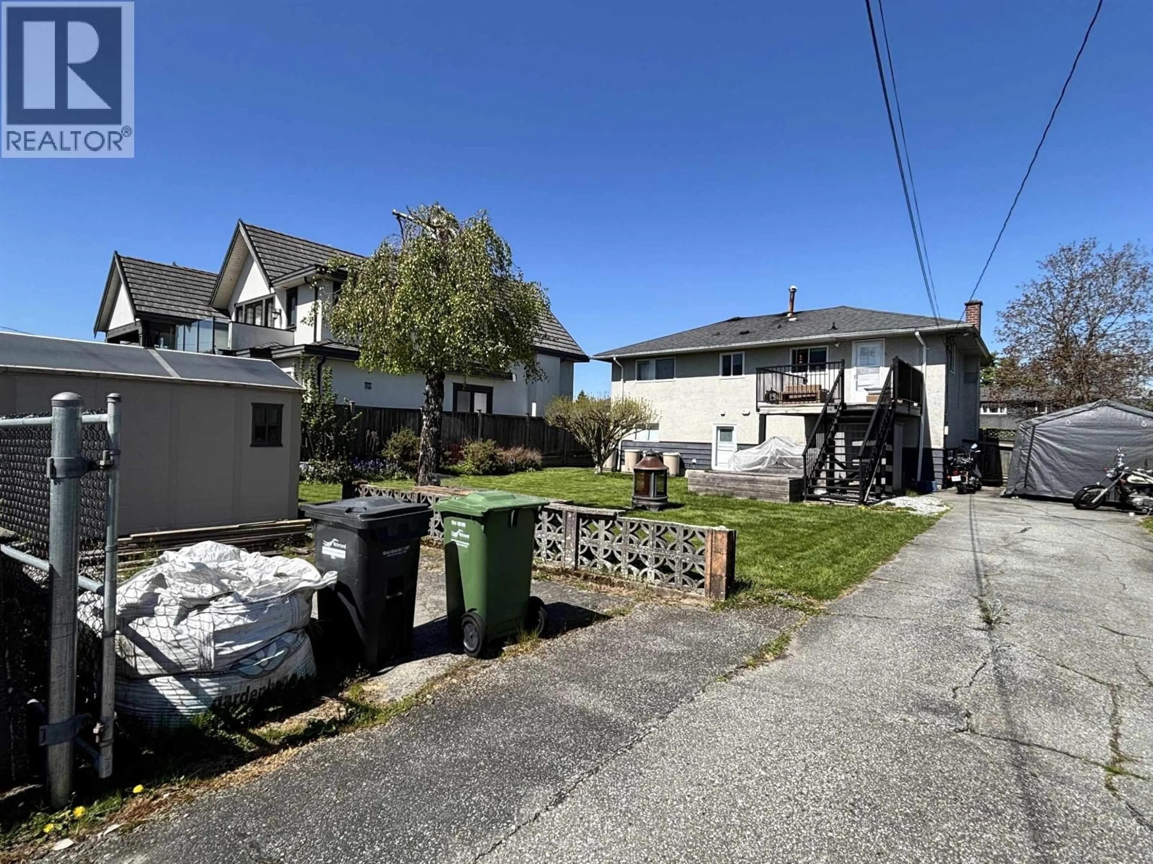 A pic from outside/outdoor area/front of a property/back of a property/a pic from drone, street for 7300 AFTON DRIVE, Richmond British Columbia V7A1A1