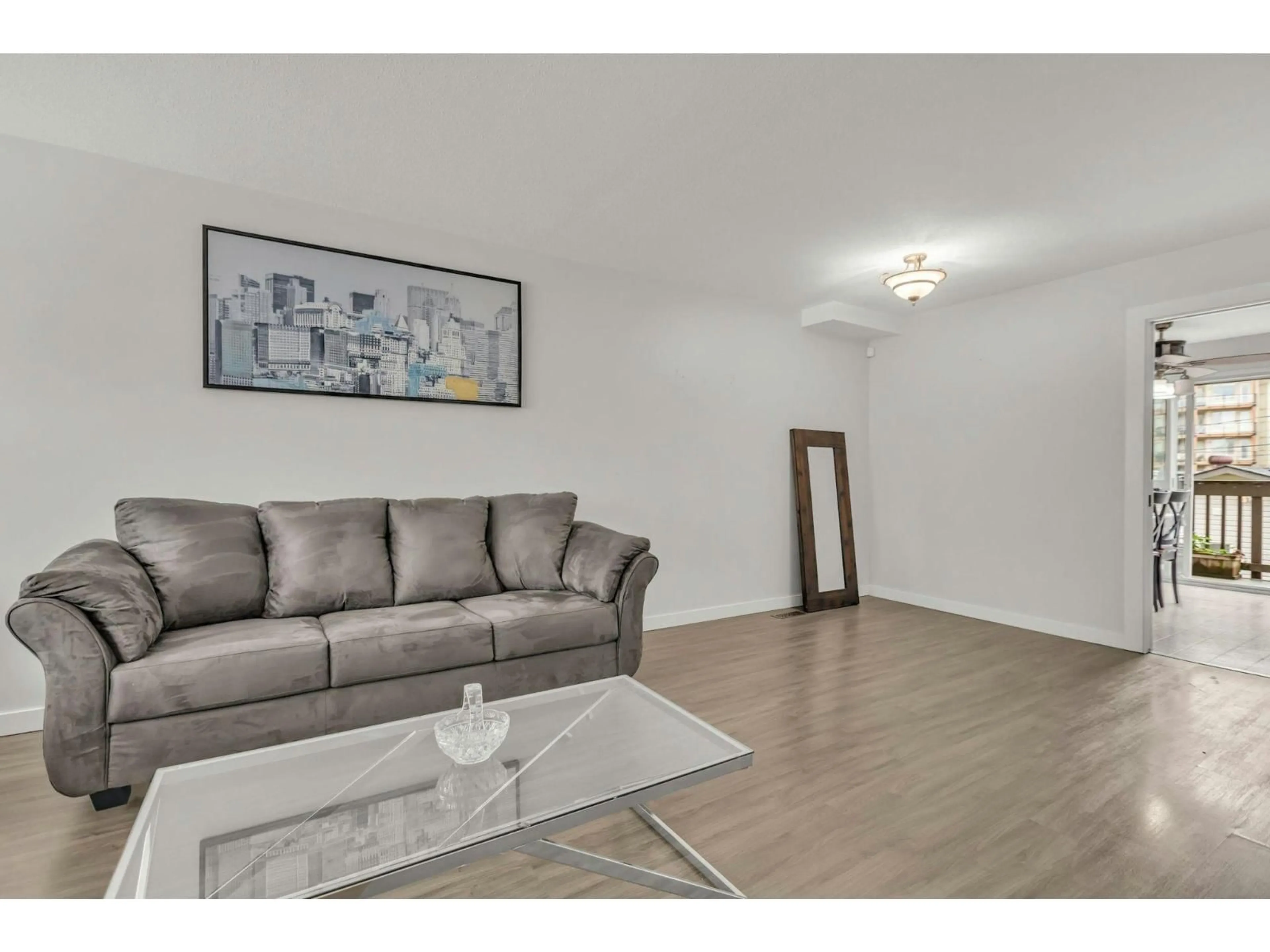 Living room with furniture, wood/laminate floor for 27 - 45740 THOMAS ROAD, Chilliwack British Columbia V2R3V9