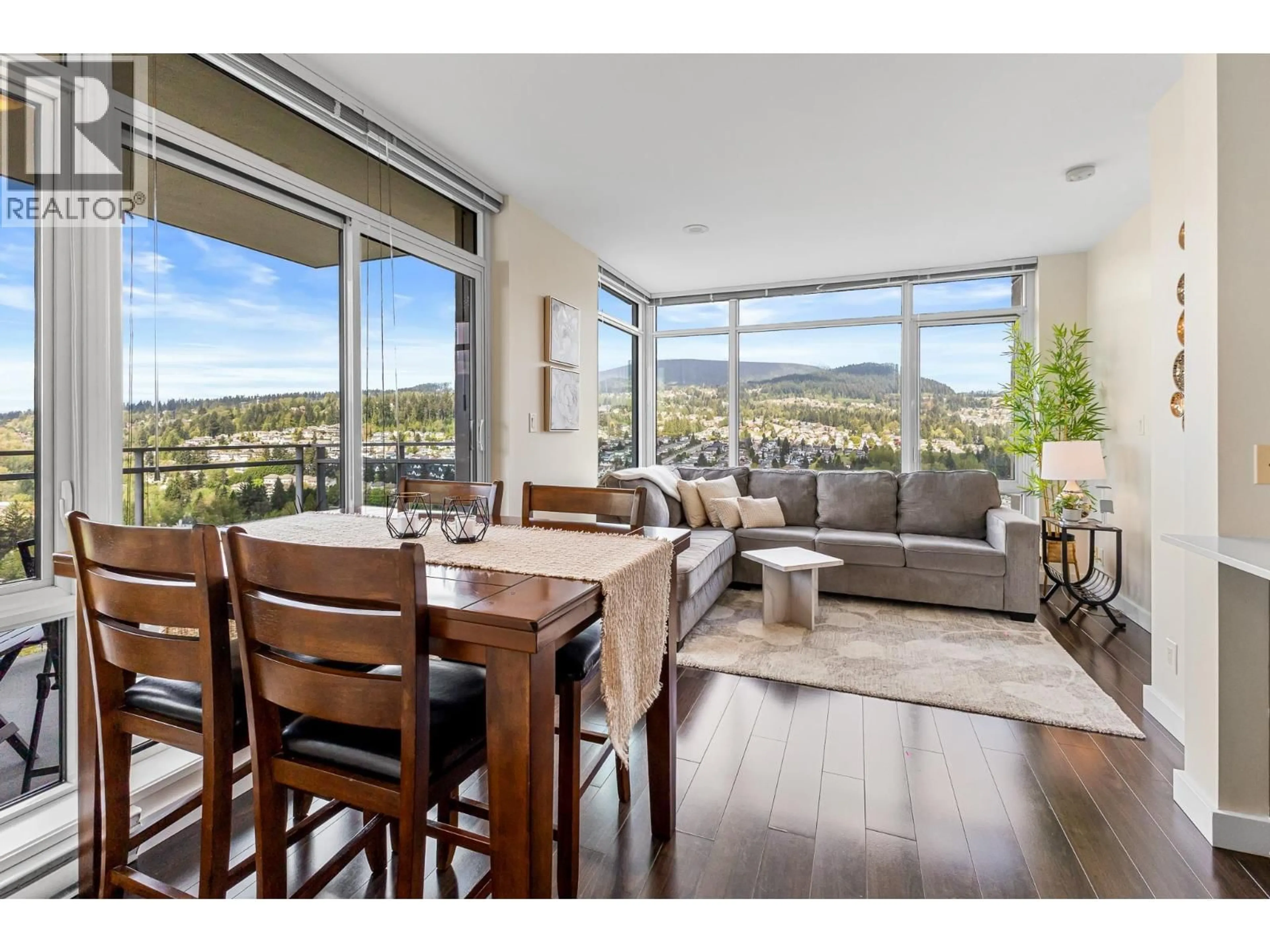 Living room with furniture, wood/laminate floor for 2709 - 2955 ATLANTIC AVENUE, Coquitlam British Columbia V3B0H9