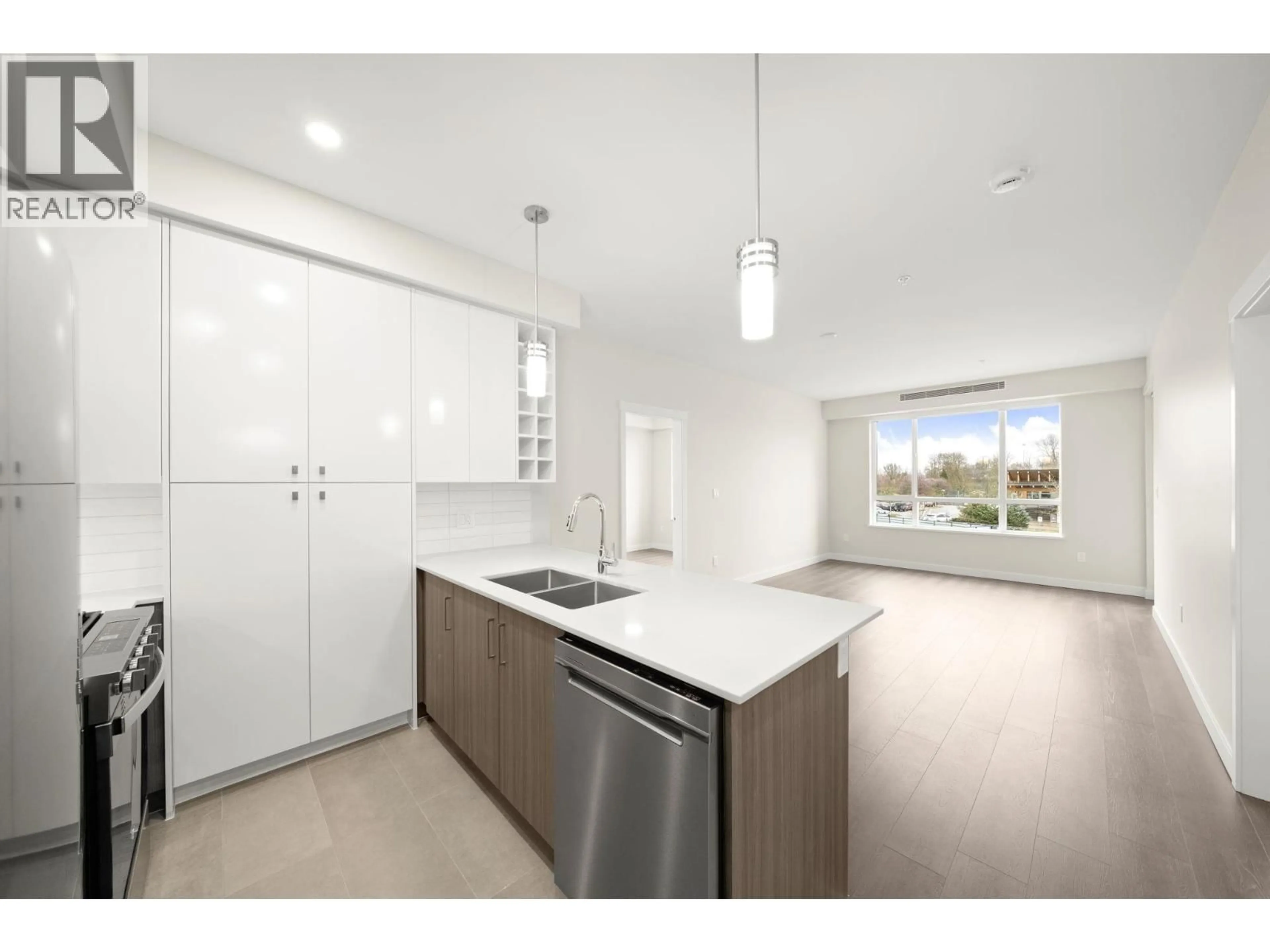Open concept kitchen, unknown for 203 - 23222 GILLEY ROAD, Richmond British Columbia V6V0C8